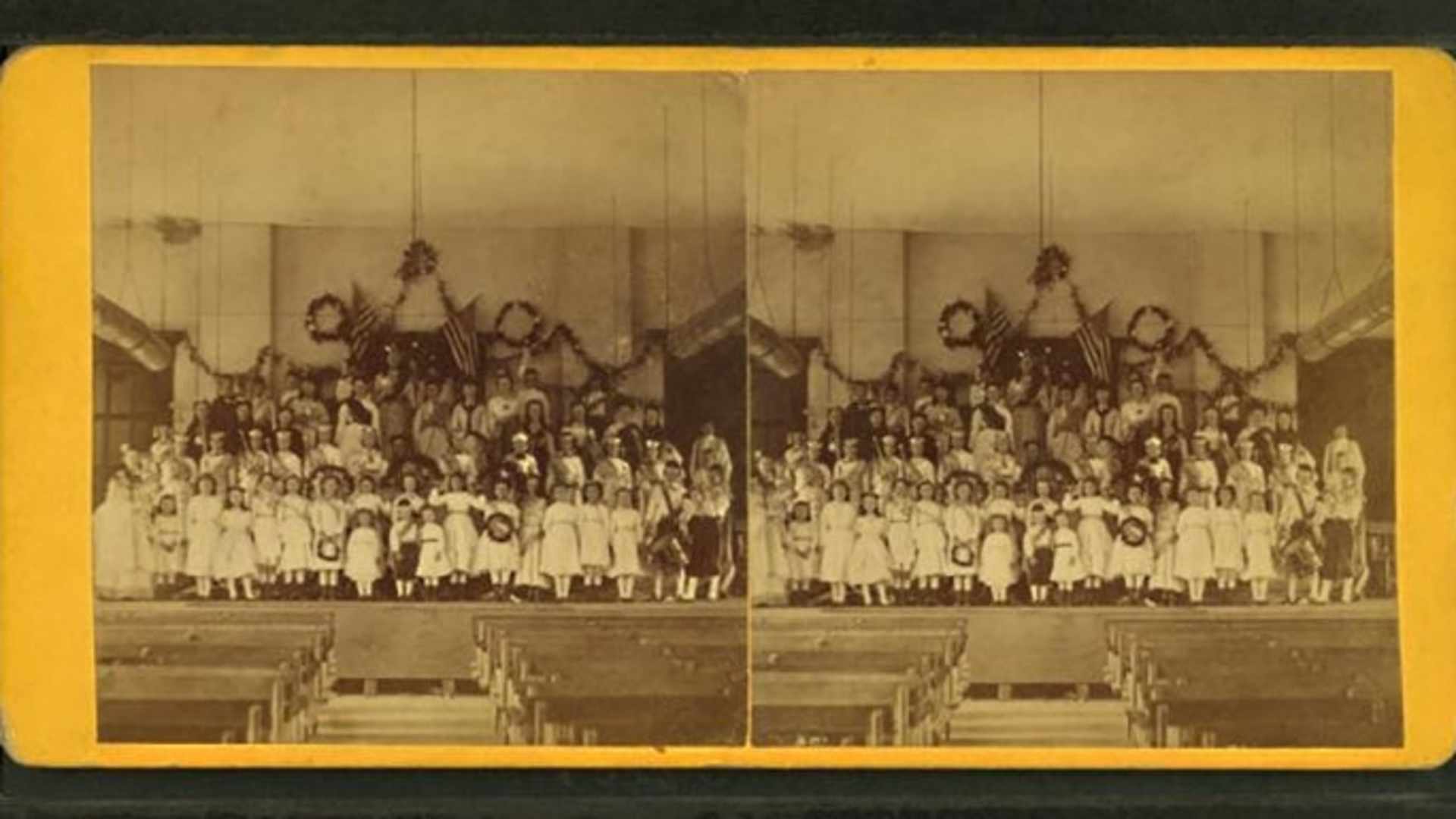 Stereo card of a singing school in a church in Winchendon, MA in the late 1800s