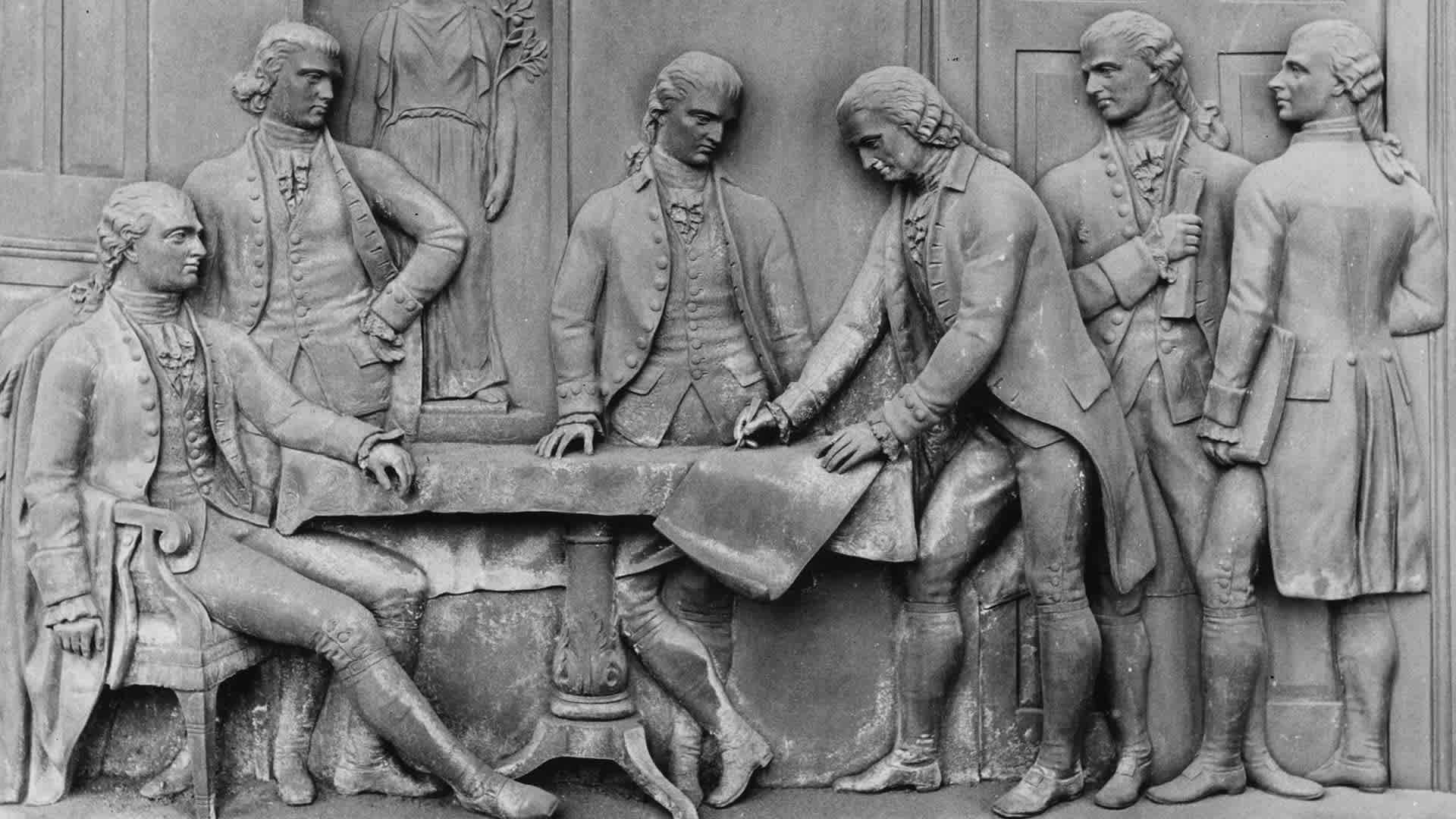 The signing of the Treaty of Paris, a peace treaty between the United States and Great Britain which concluded the American War of Independence, immortalized in bronze on a door. (Photo by Three Lions/Getty Images)
