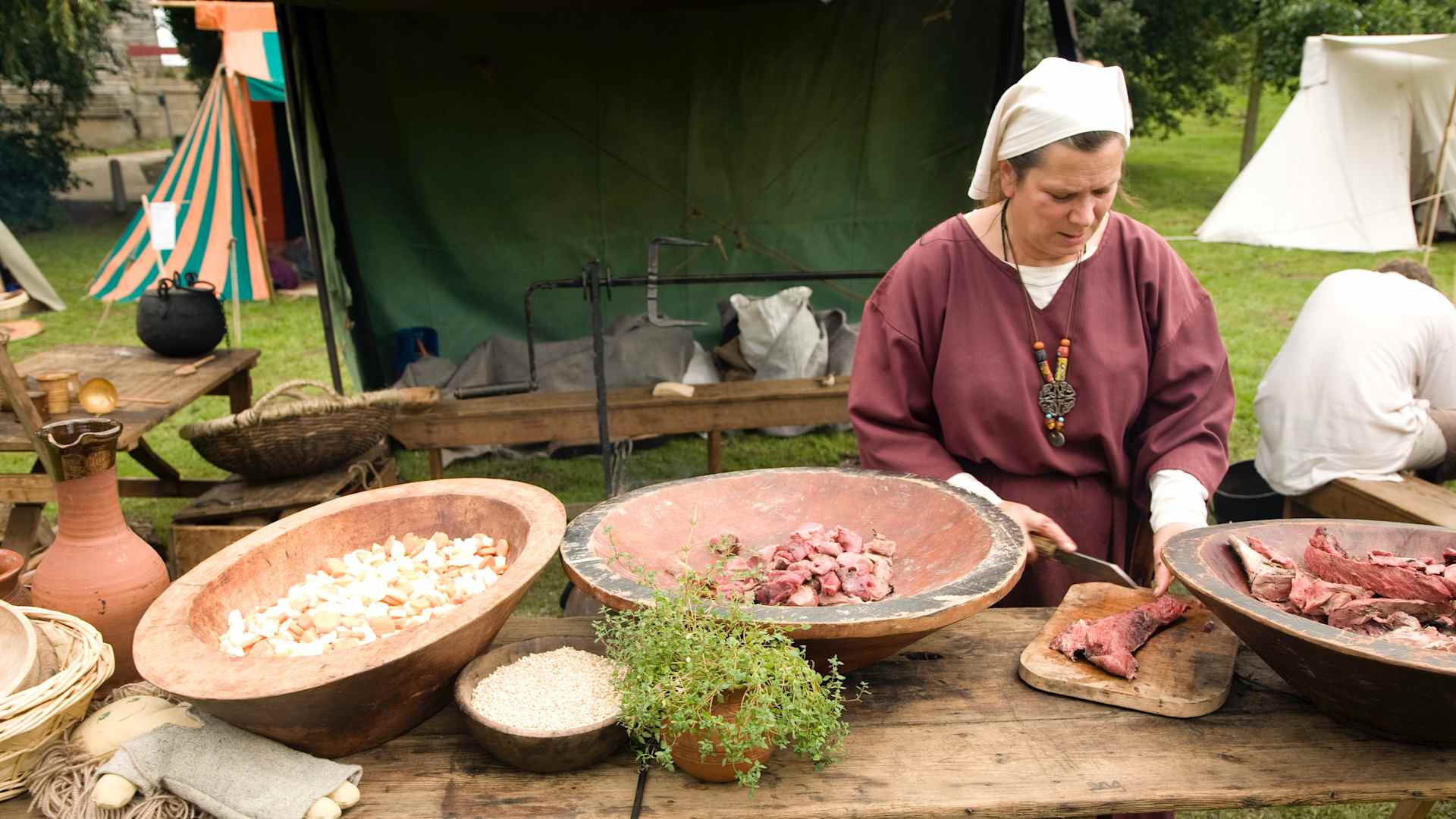 Woman cooking Historical re-enactment Saxon, Viking, Norman history, Woodbridge, Suffolk