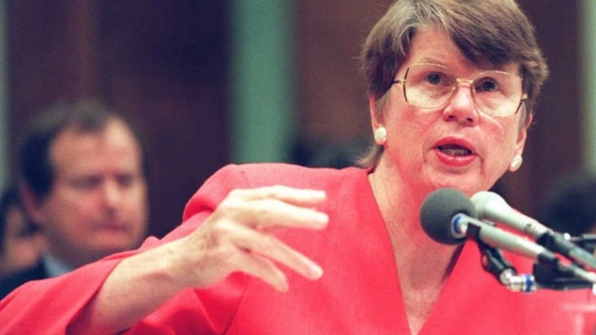U.S. Attorney General Janet Reno testifies to a House subcommittee on Capitol Hill in Washington about the 1993 raid on the Branch Davidian compound near Waco, Texas. (Credit: DAVID AKE/AFP/Getty Images)