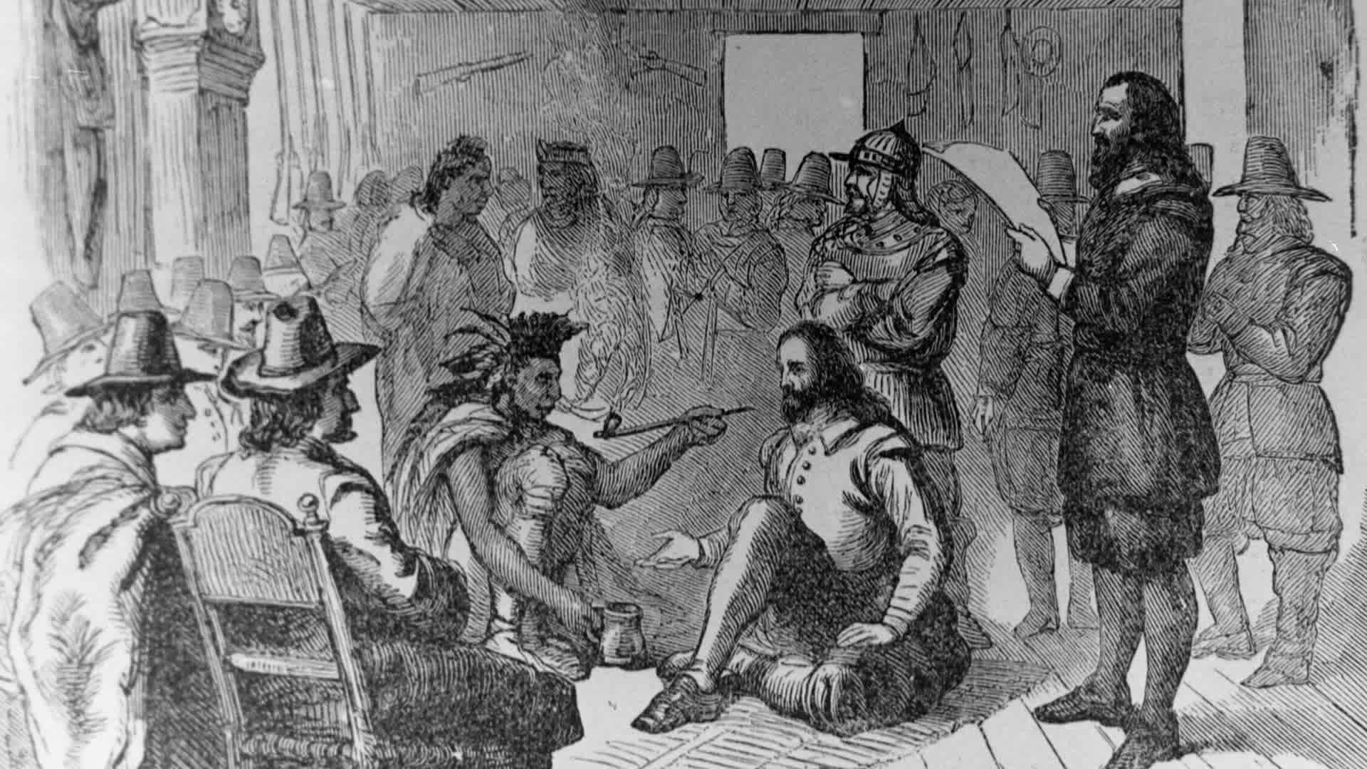 Ousamequin, chief of the Wampanoag signs a peace treaty with Governor John Carver (1576 - 1621).