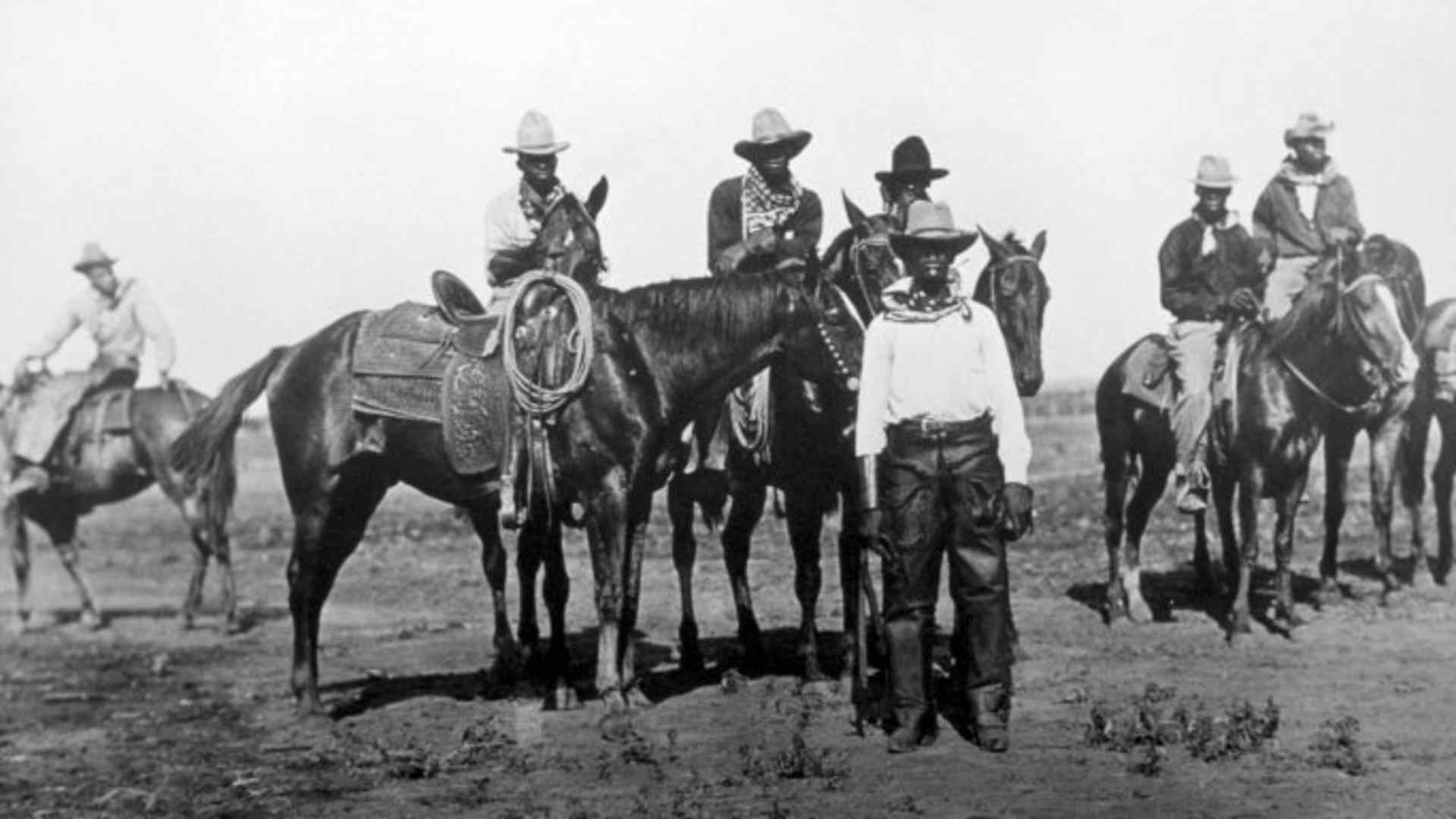 Black cowboys on horseback, circa 1880