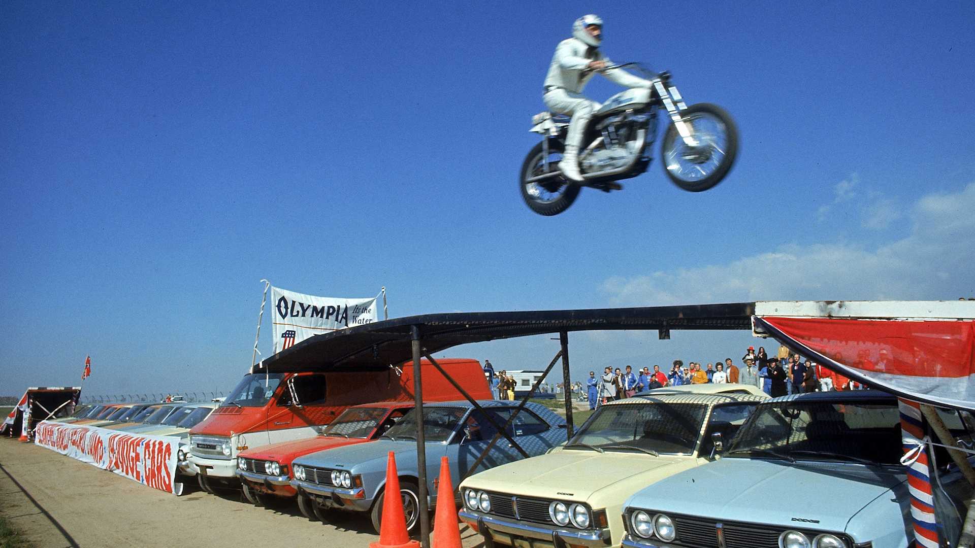 Evel Knievel mid-jump during a successful attempt to jump over a row of 19 cars, a record at the time, on February 28, 1971.