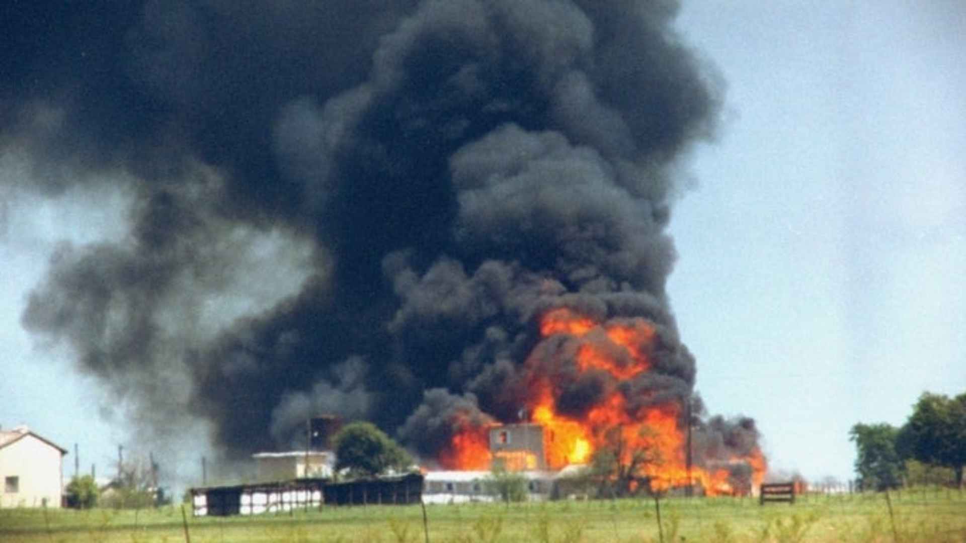 Fire and smoke consuming the David Koresh-led Branch Davidian cult compound, 1993.  (Credit: Mark Perlstein/The LIFE Images Collection/Getty Images)