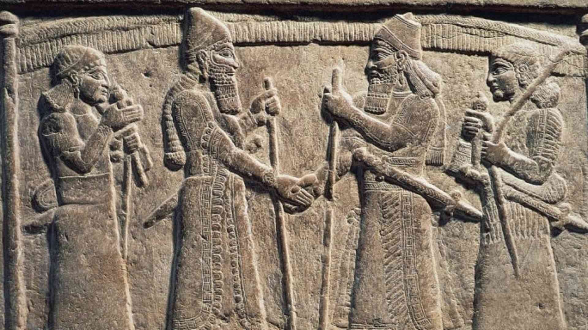 King Shalmaneser III of Assyria meeting a Babylonian, detail from Shalmaneser III's throne, relief on stone.