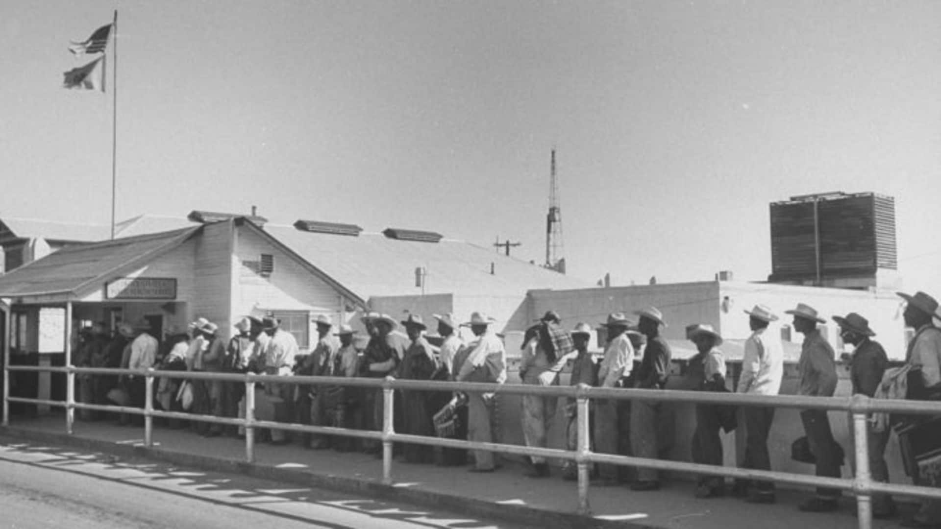 Migrant Mexican workers standing in line at the U.S. Public Health Station. The notion that Mexicans overburden the government, particularly in health, education and welfare, drove legislation to repatriate, and in some cases, sterilize immigrants.