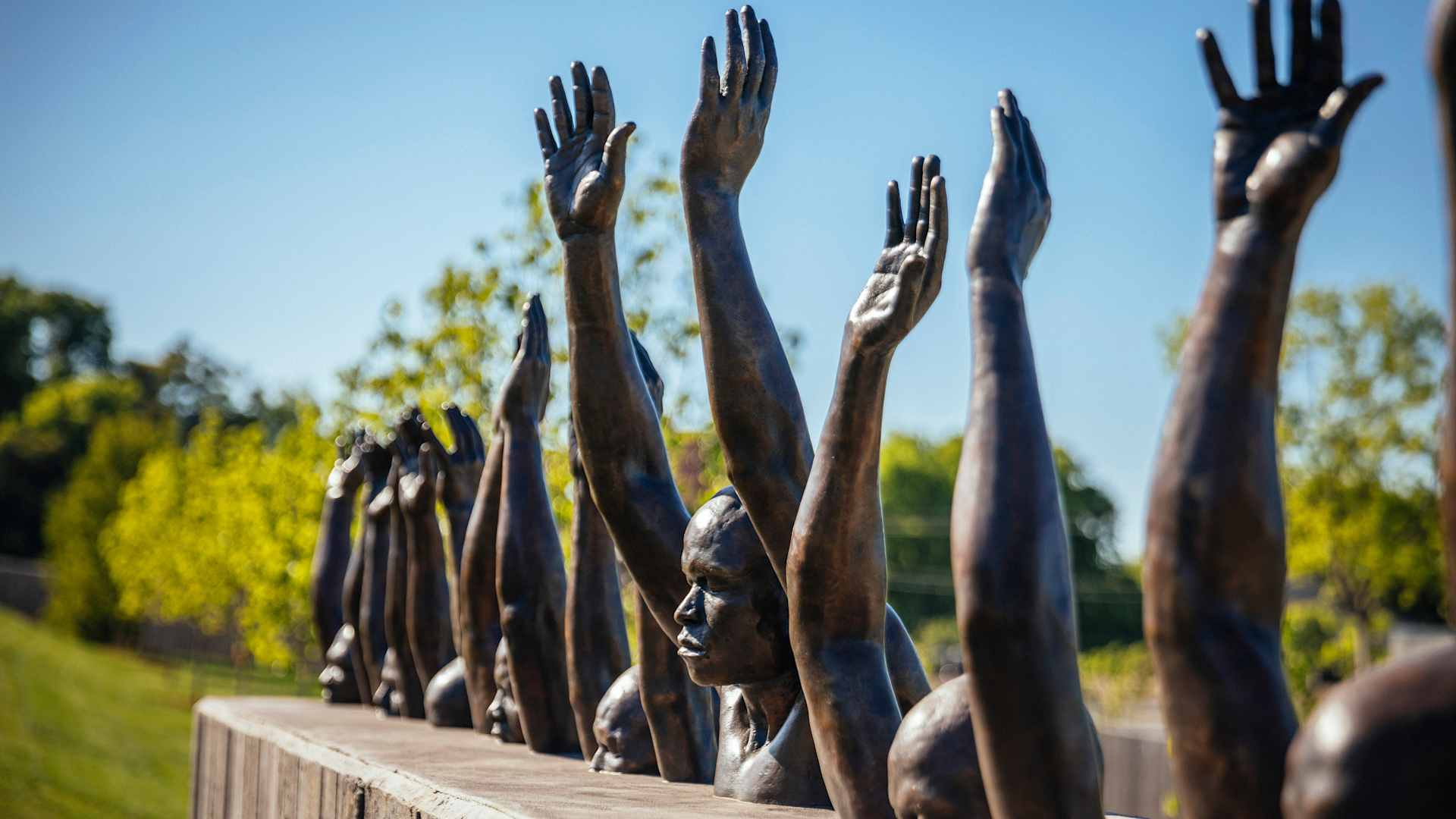 Raise Up, a sculpture by Hank Willis Thomas, on the grounds of the National Memorial for Peace and Justice. Dedicated to the victims of American white supremacy, the site demands a reckoning with with the lynching of thousands of black people in a decades-long campaign of racist terror.