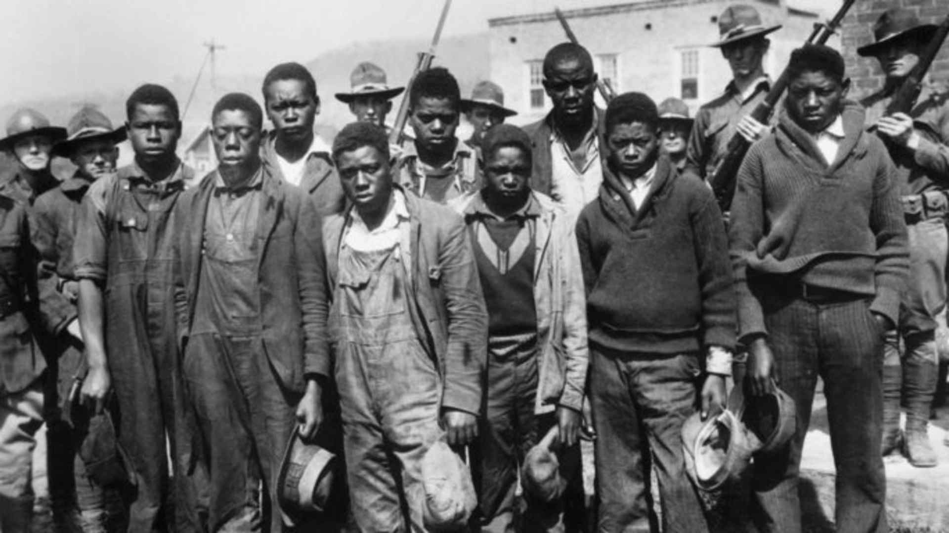The accused Scottsboro Boys (left to right): Clarence Norris, Olen Montgomery, Andy Wright, Willie Roberson, Ozie Powell, Eugene Williams, Charlie Weems, Roy Wright, and Haywood Patterson. (Credit: Bettmann Archive/Getty Images)