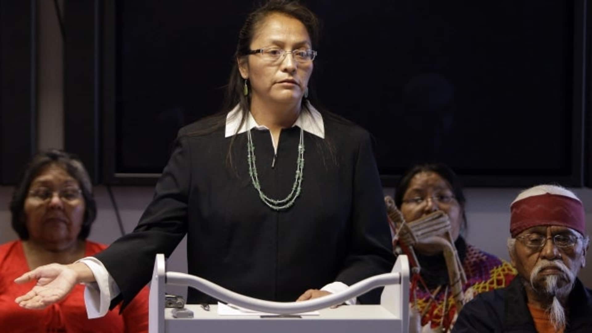 Carletta Tilous, of Arizona's Havasupai tribe, talks about giving blood during a news conference after settling a lawsuit alleging Arizona State University scientists of misusing blood samples meant for diabetes research to study schizophrenia, inbreeding and ancient population migration. (Credit: Ross D. Franklin/AP/REX/Shutterstock)