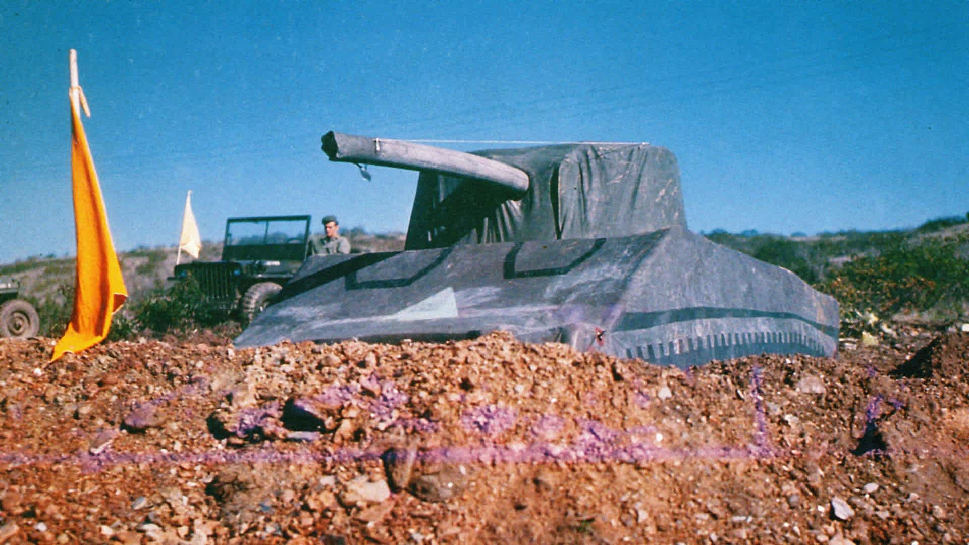 An inflatable dummy tank, modeled after the M4 Sherman, on the field during Operation Fortitude in southern England, 1944. It was used to confuse German intelligence in two ways: first, by making it seem that the Allies had more tanks than they did; and second, to hide and downplay the importance of the location of their real tanks in order to make it seem that the invasion would not occur at Normandy.