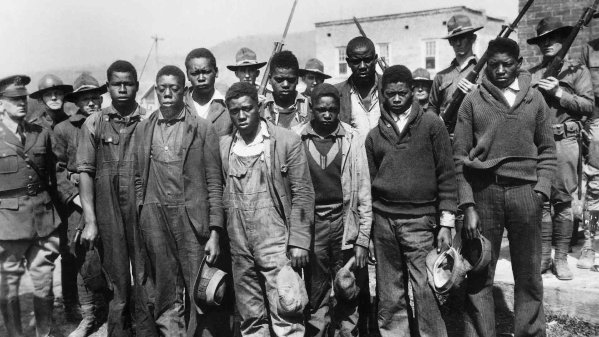 The accused Scottsboro Boys (left to right): Clarence Norris, Olen Montgomery, Andy Wright, Willie Roberson, Ozie Powell, Eugene Williams, Charlie Weems, Roy Wright, and Haywood Patterson.