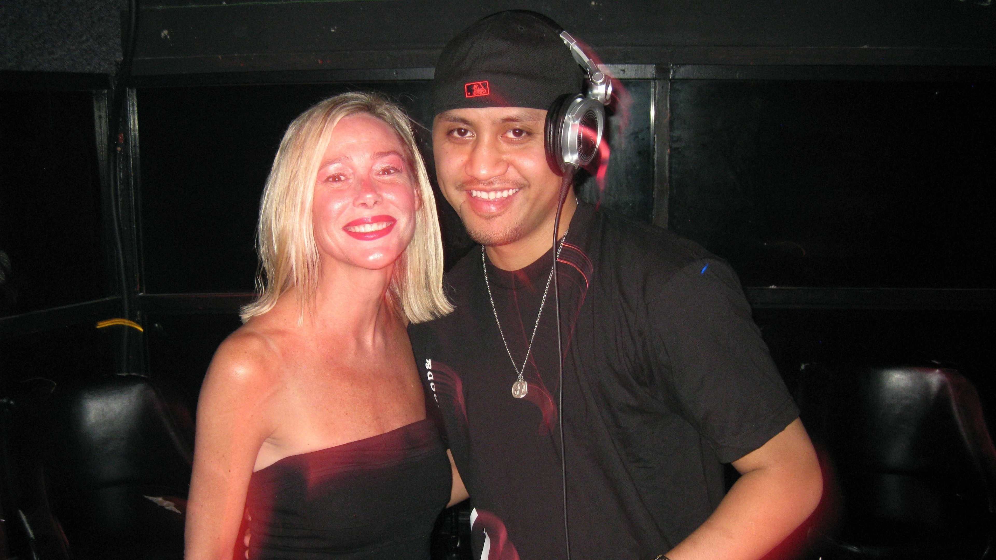 Seattle, Washington, USA. 23rd May, 2009. Just another Saturday night, as VILI FUALAAU, 26, aka 'DJ HEADLINE' spinning with his wife and host MARY KAY LETOURNEAU-FUALAAU, 47, at 'Hot for Teacher' night at Fuel Sports Eats &amp; Beats in Seattle's Pioneer