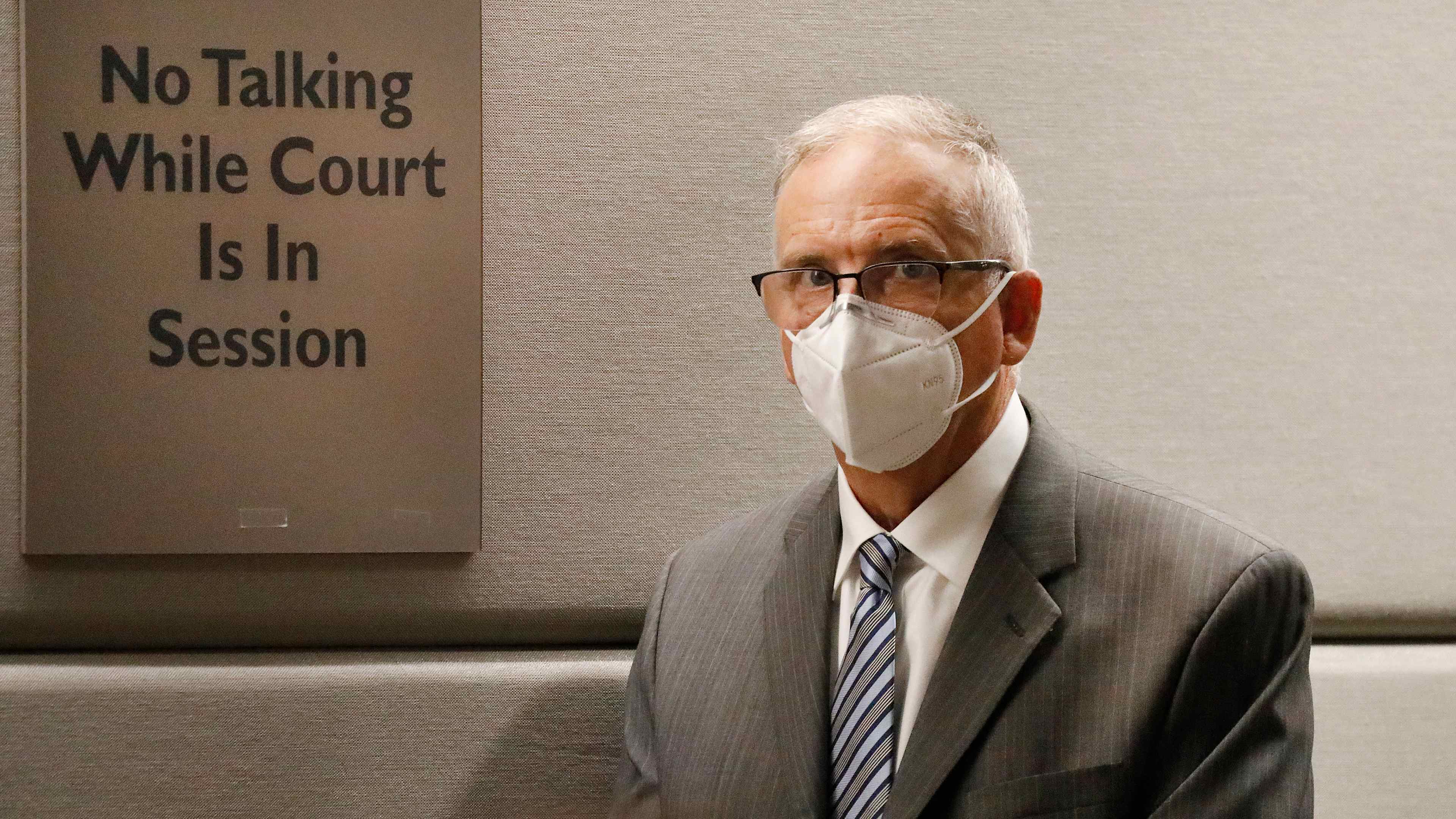 UCLA Gynecologist Dr. James Heaps appears in Los Angeles Superior Court listening as Deputy DA Morgan Mallory, right, addresses the Judge. Heaps was taken into custody after additional charges were filed against him this morning.