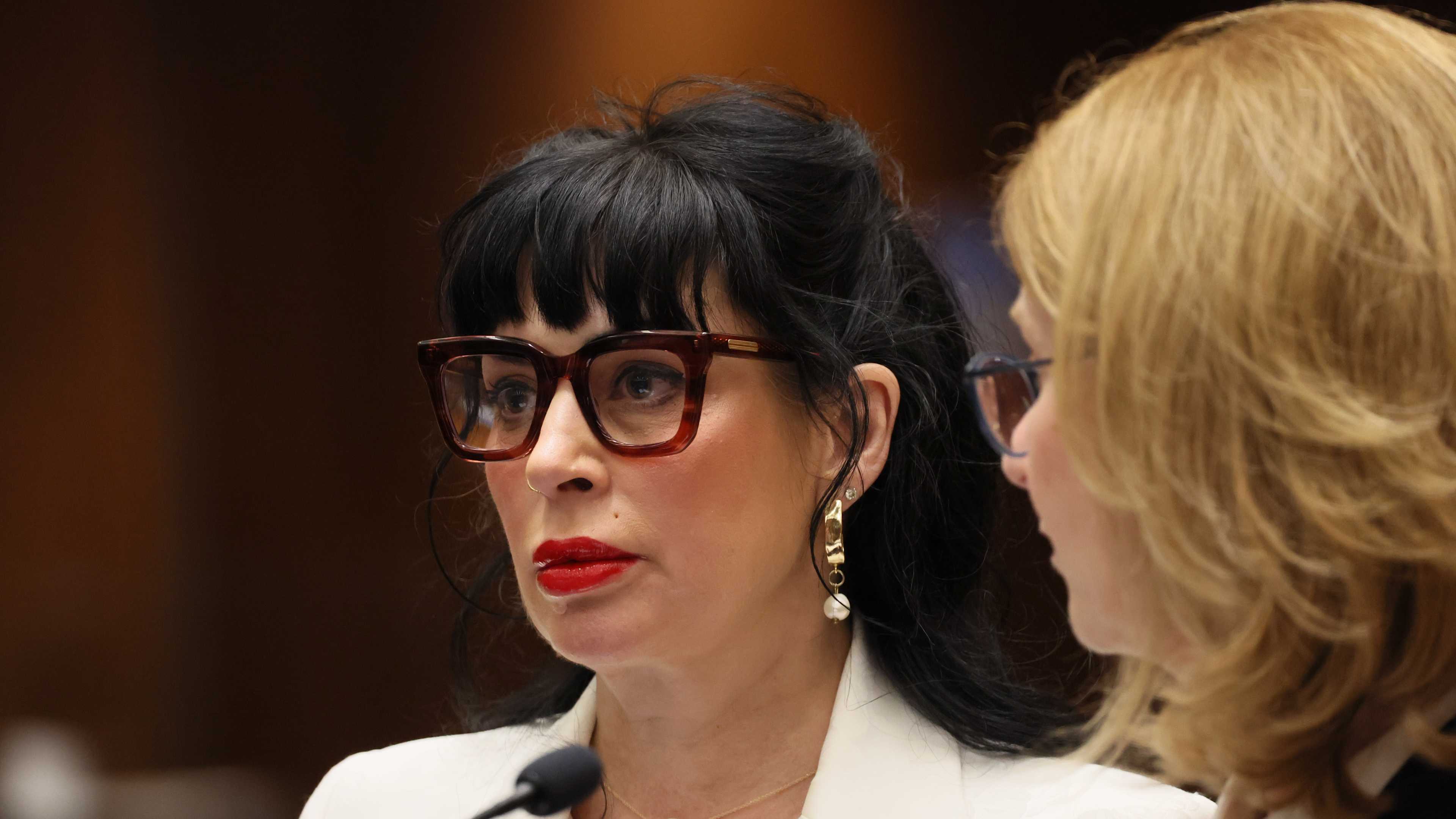 Jillian Lauren (wife of Weezer bassist accused of shooting at cops) appears at a pre-arraignment hearing