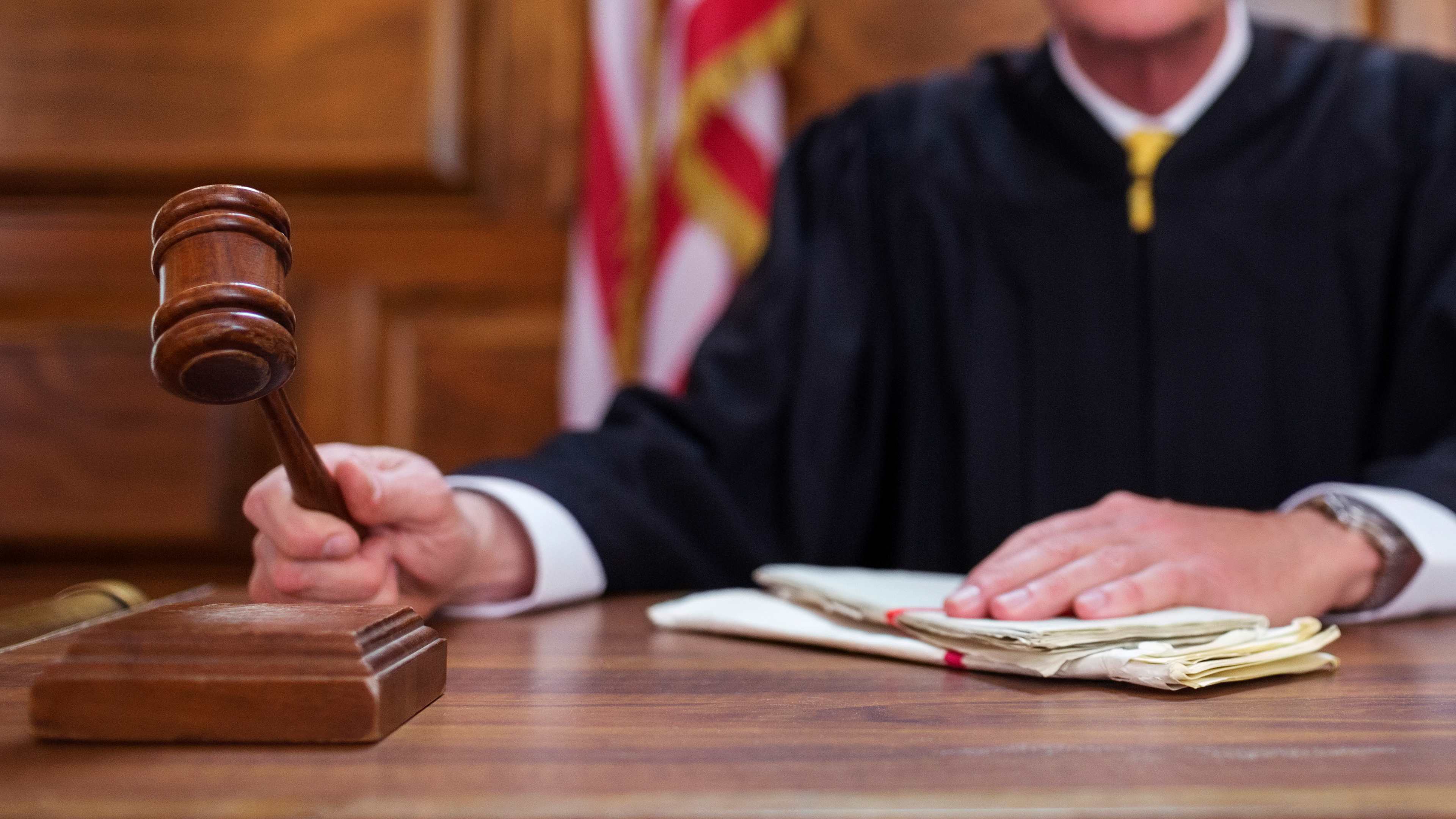 Judge banging gavel in court