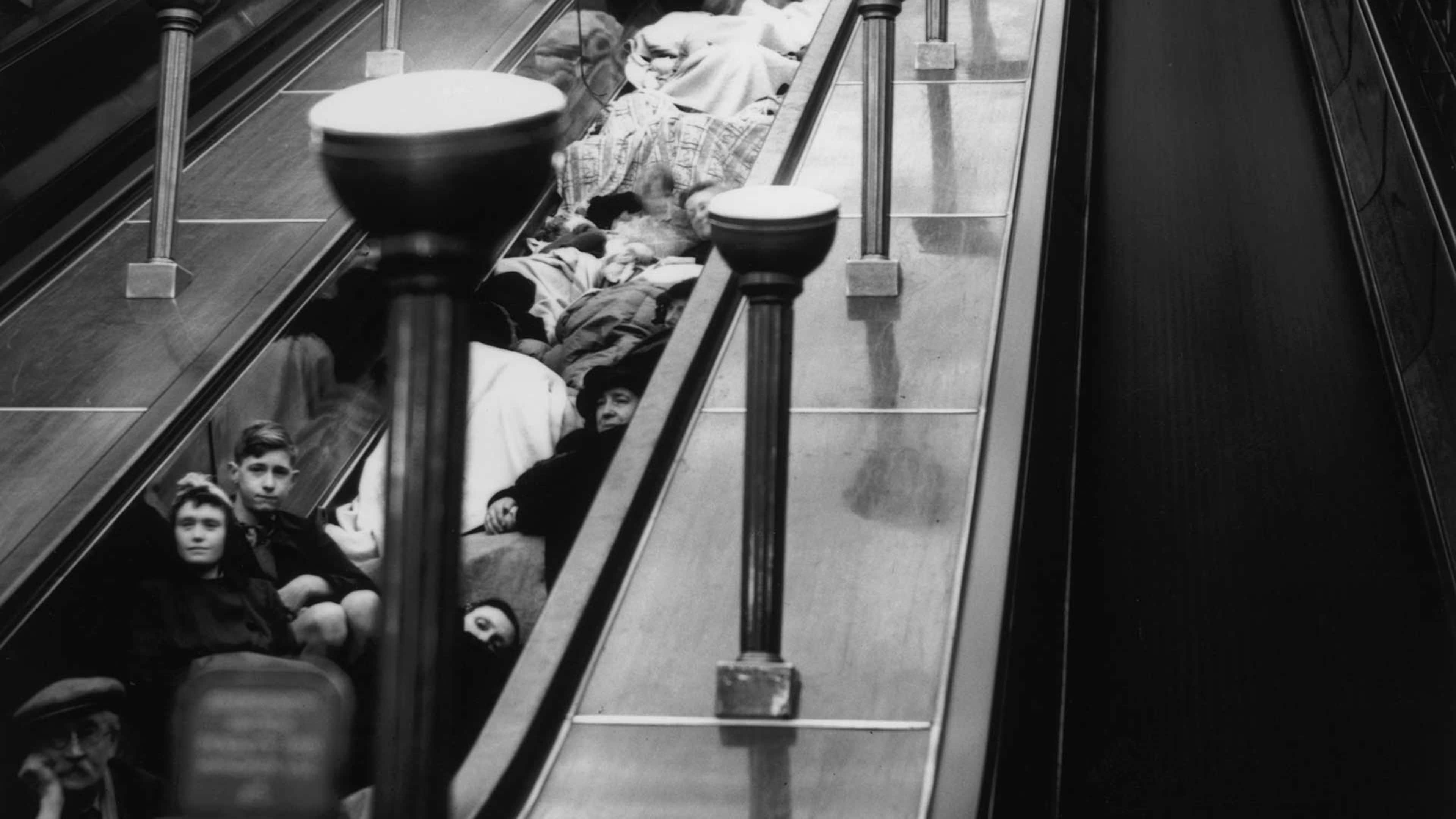 City dwellers gather for sleep on an escalator in the London Underground in 1940.