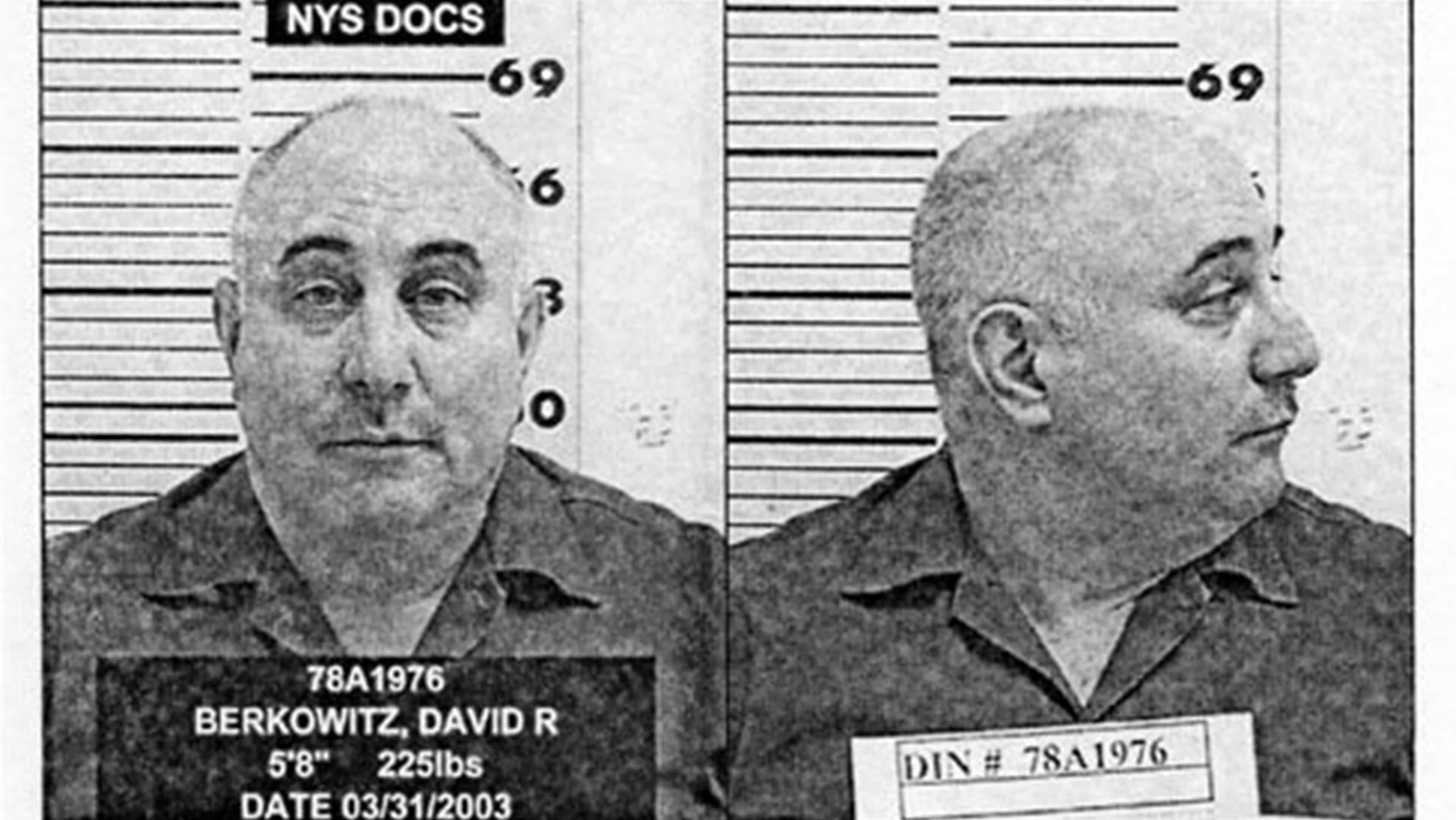 The image shows a mugshot-style photograph of a man, with his name and identification number displayed below the image. The background appears to be a standard police lineup backdrop.