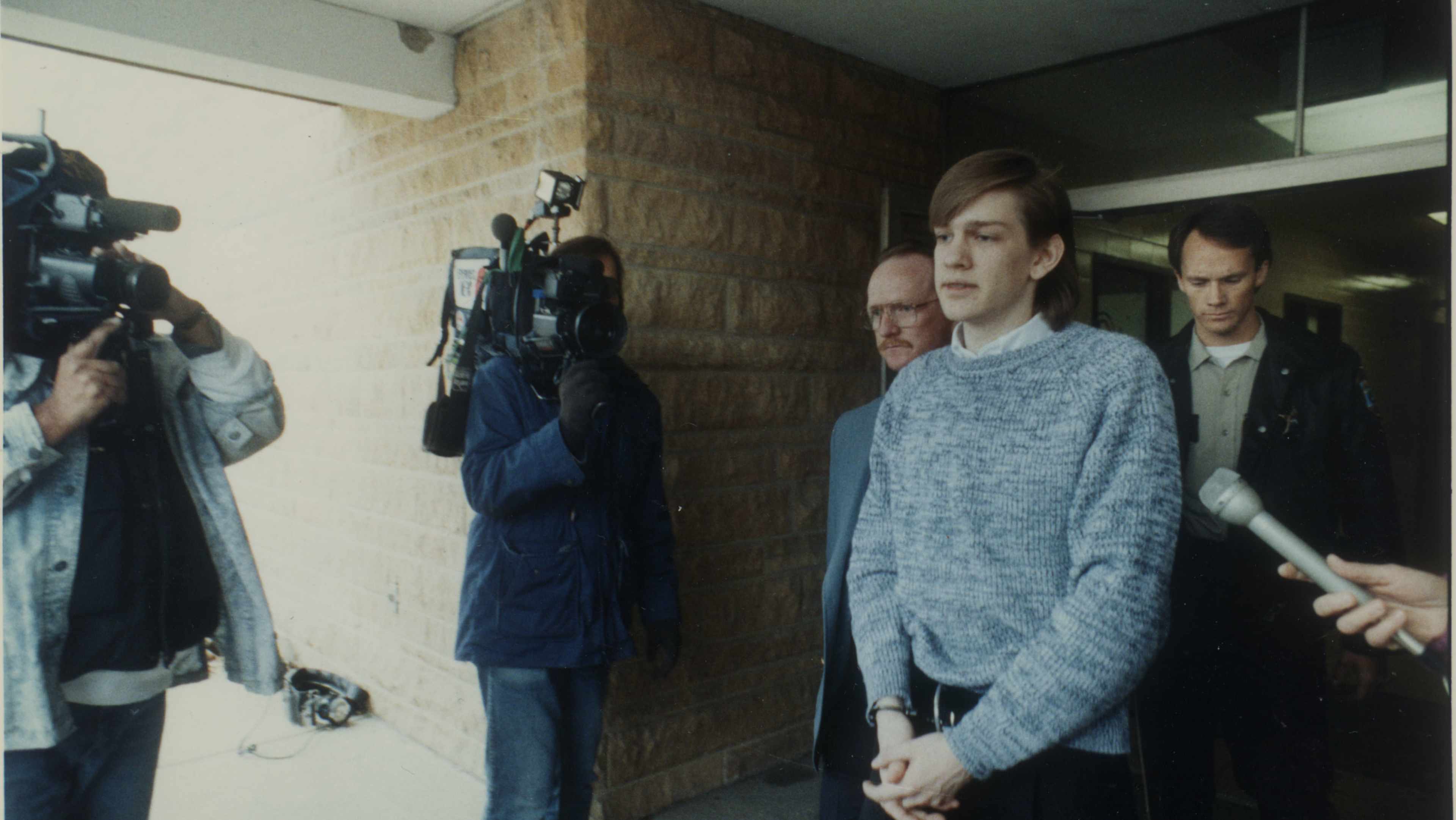 Star Tribune cutline of Tuesday October 17, 1989: David Brom was escorted to a car that took him to the St. Cloud reformatory Monday after he was sentenced in Rochester. // Brom killed four members of his family with an ax in February 1988.//Star Tribune