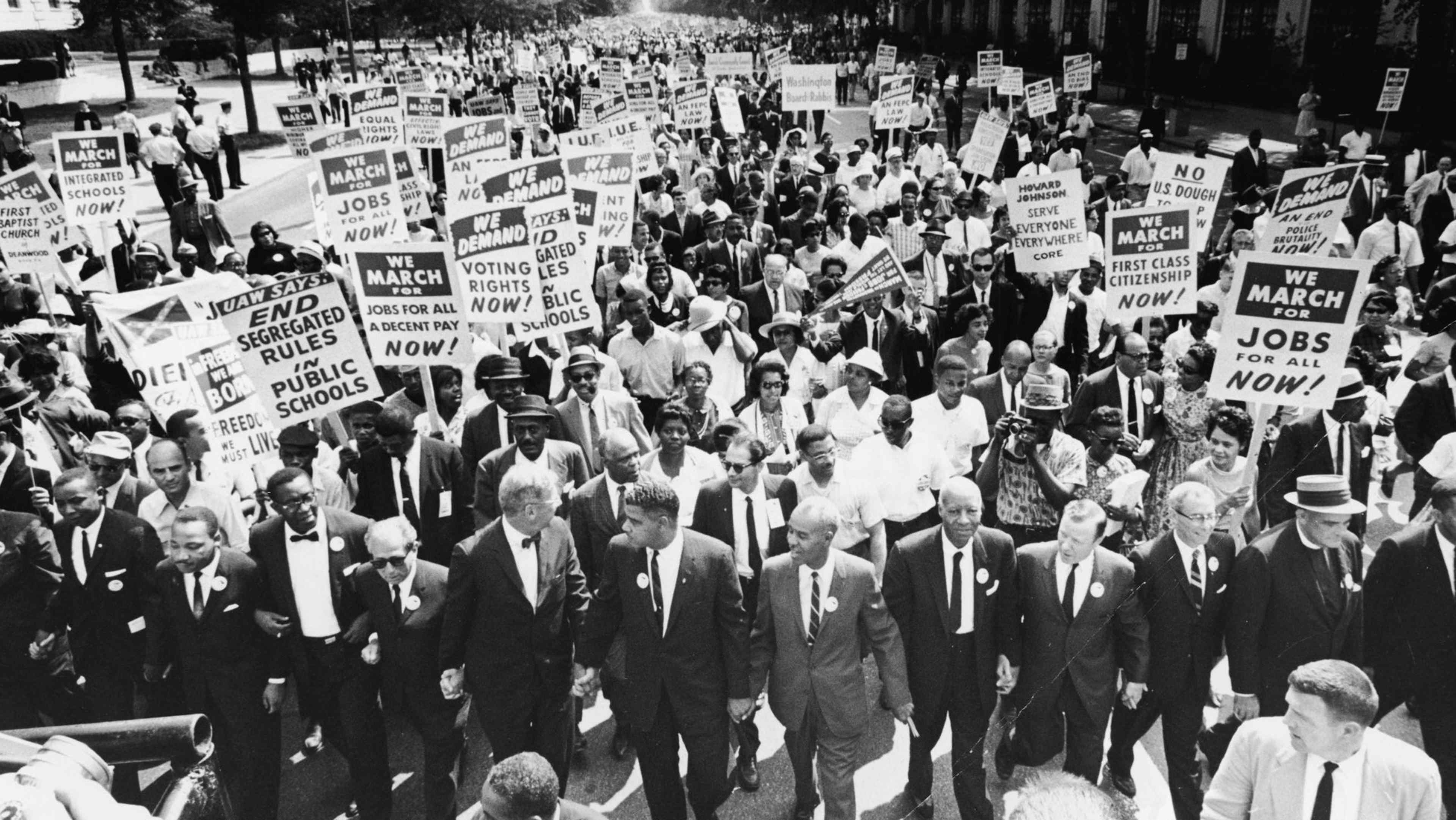Civil Rights Leaders At The March On WashingtonCivil rights Leaders hold hands as they lead a crowd of hundreds of thousands at the March on Washington for Jobs and Freedom, Washington DC, August 28, 1963. Those in attendance include (front row): James Meredith and Martin Luther King, Jr. (1929 - 1968), left; (L-R) Roy Wilkins (1901 - 1981), light-colored suit, A. Phillip Randolph (1889 - 1979) and Walther Reuther (1907 - 1970). (Photo by Express/Hulton Archive/Getty Images)