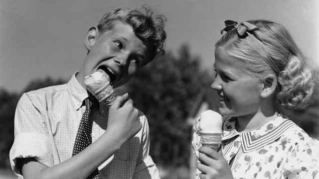 Boy and girl eating ice cream