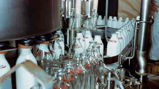 A milk bottling plant, circa 1950.