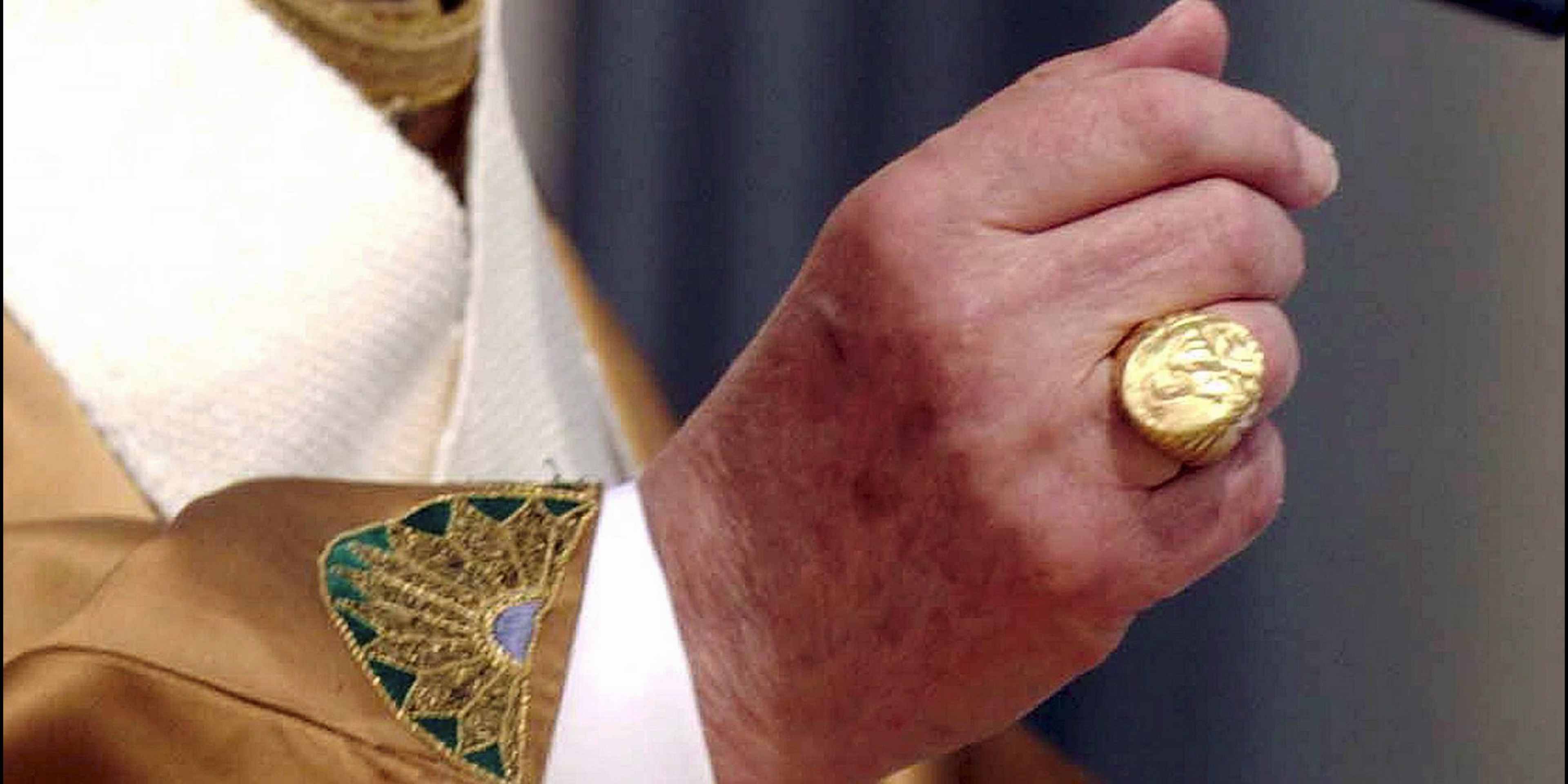Pope Benedict XVI is formally installed as Pope in an open-air Mass in St Peter's Square in Rome, Italy on April 24, 2005. His big gold "fisherman's ring" is see on his right hand.