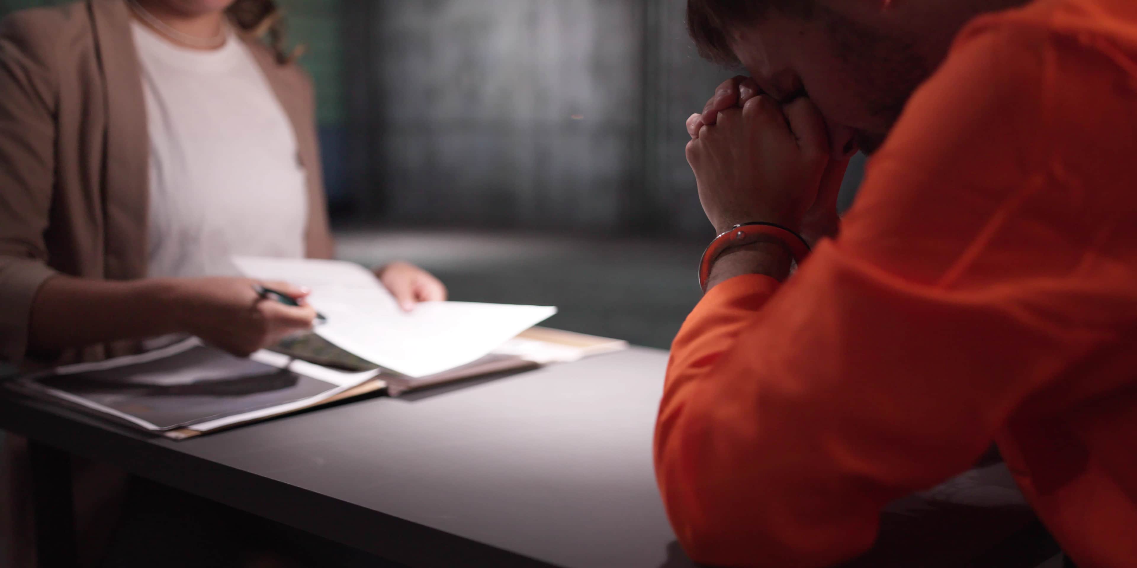 Criminal Defense Attorney In Prison. Police Investigator