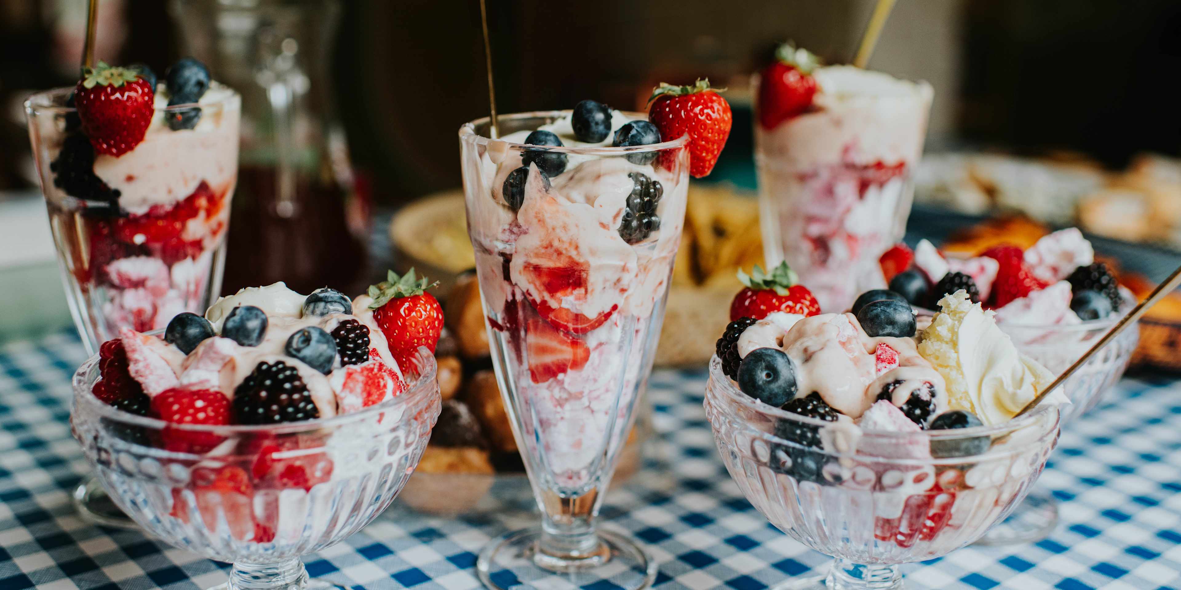 Eton mess served in dessert bowls and glasses