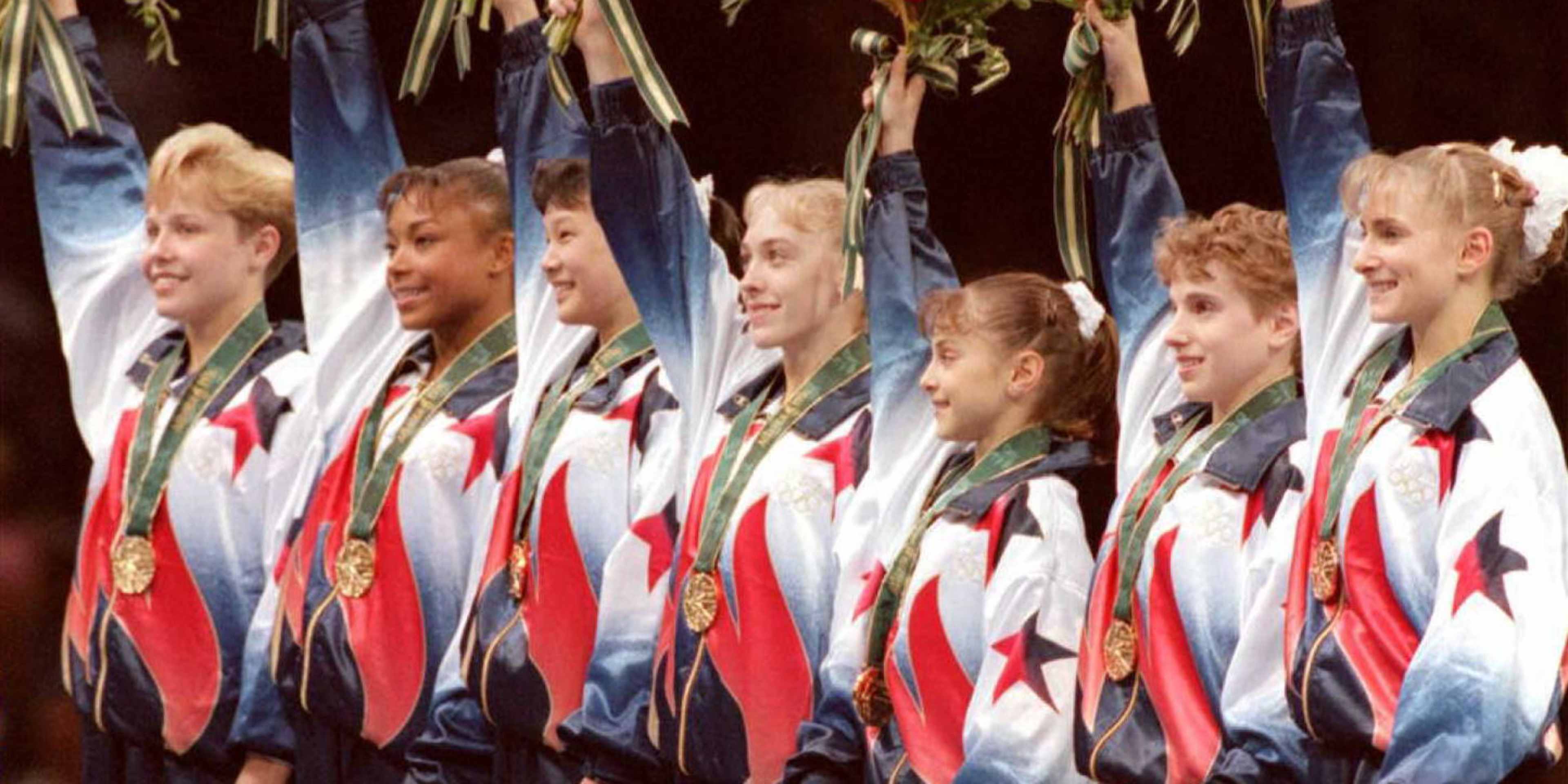 The women's US Olympic gymnastics team waves to th