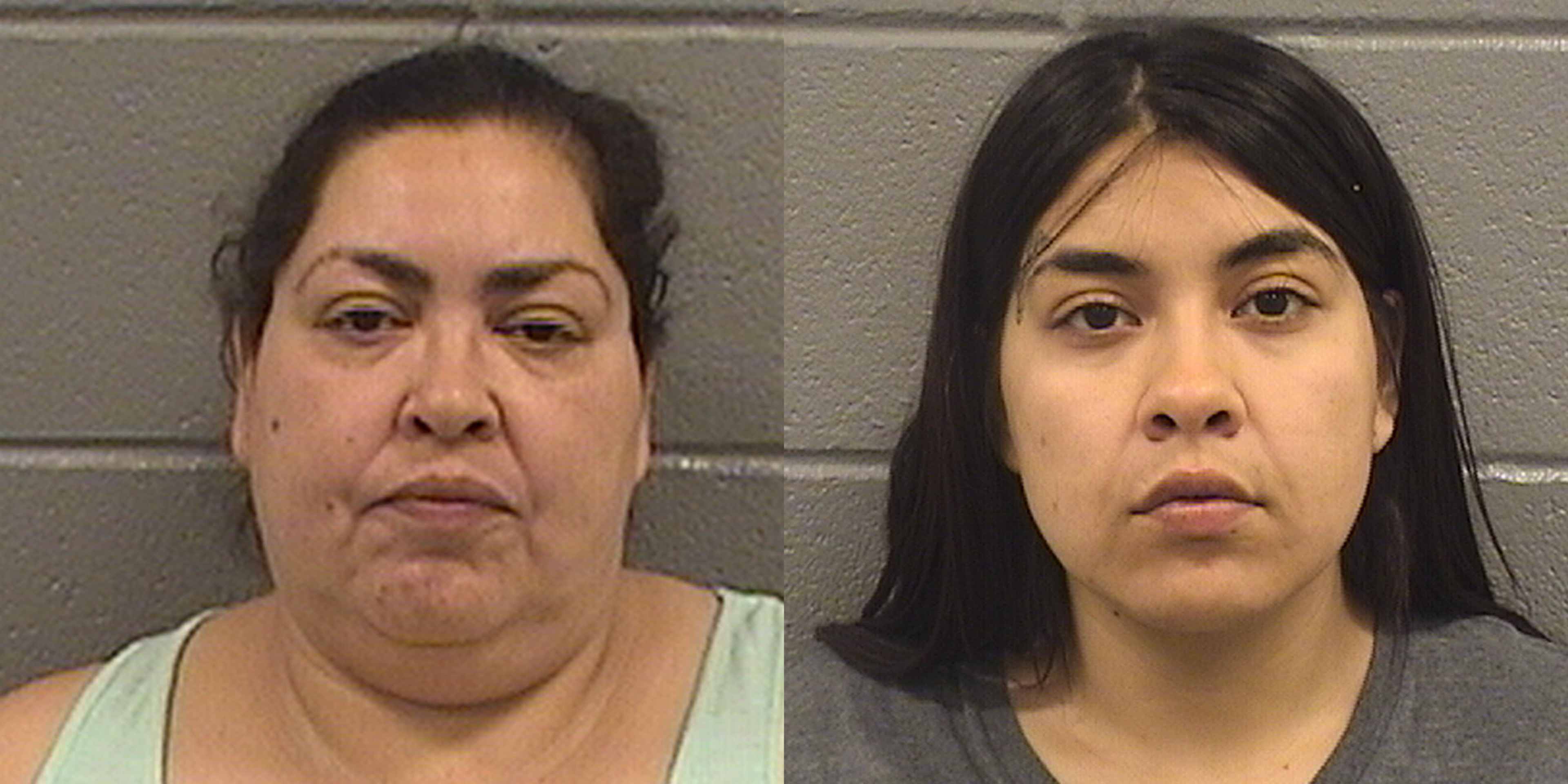 The image shows two individuals, an older woman and a younger woman, posing for what appears to be a mugshot or identification photograph. They are standing in front of a plain, gray background.