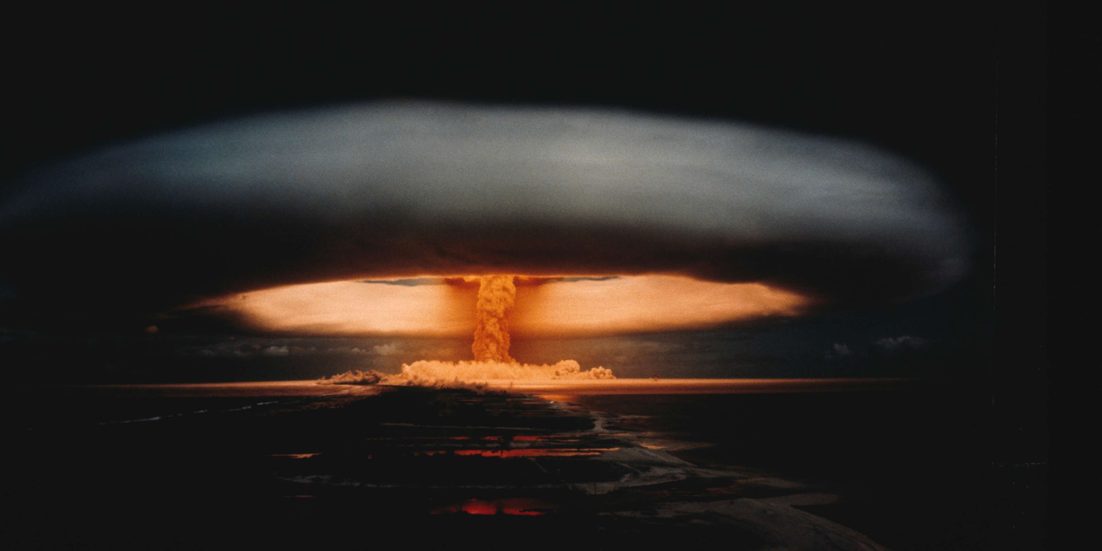 Nuclear explosion and atomic mushroom cloud. the image depicts a nuclear exercise in Mururoa. | Location: Mururoa, French Polynesia, France