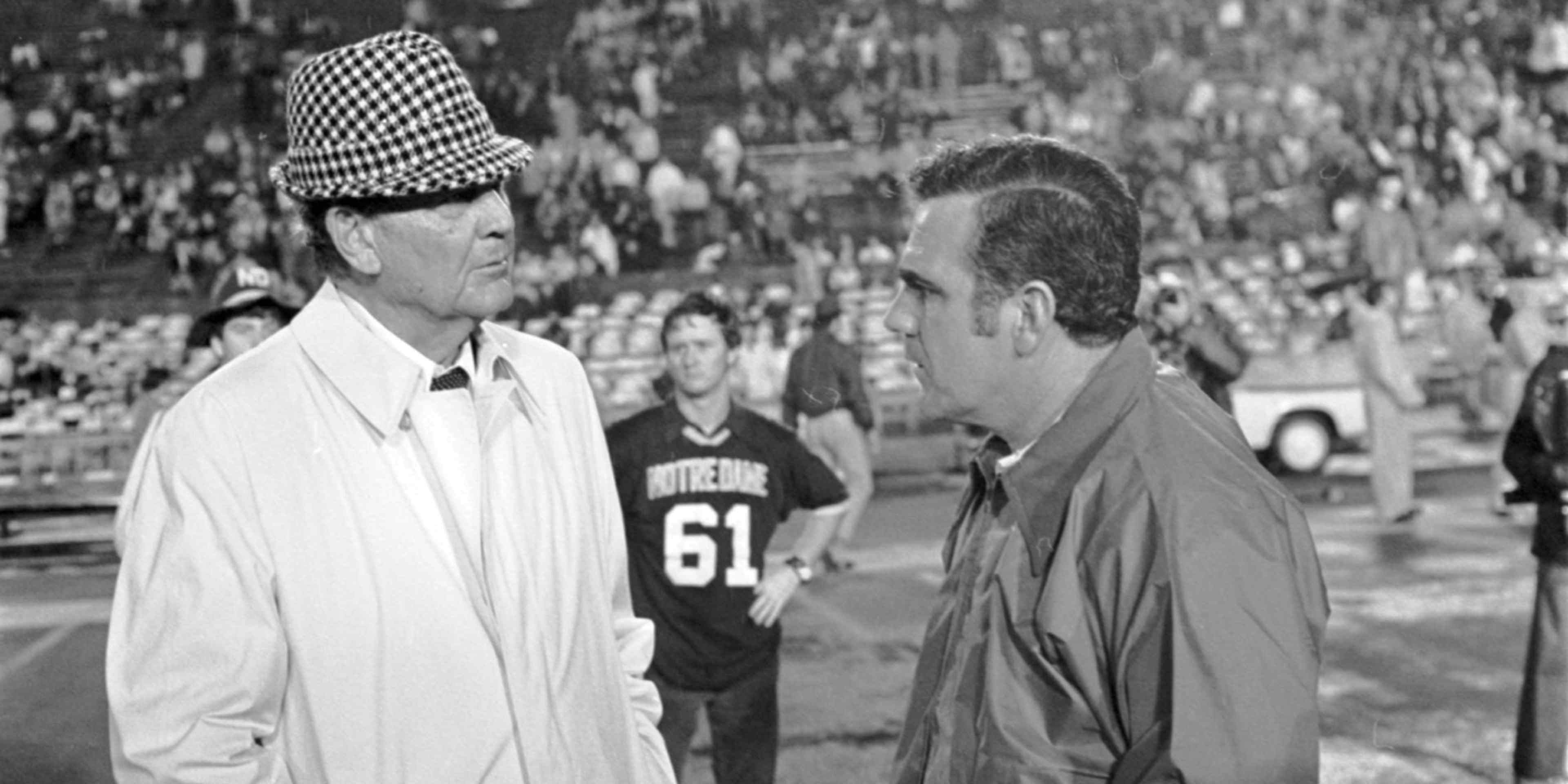 NEW ORLEANS, LA- DEC 31, 1973 : Ara Parsegian (right) head coach of the Notre Dame University Fighting Irish talks with University of Alabama Crimson Tide head coach Paul "Bear" Bryant before the the 1973 Sugar Bowl at Tulane Stadium in New Orleans, Louisiana on December 31, 1973. Notre Dame won 24-23. (Photo by Notre Dame/Collegiate Images via Getty Images)