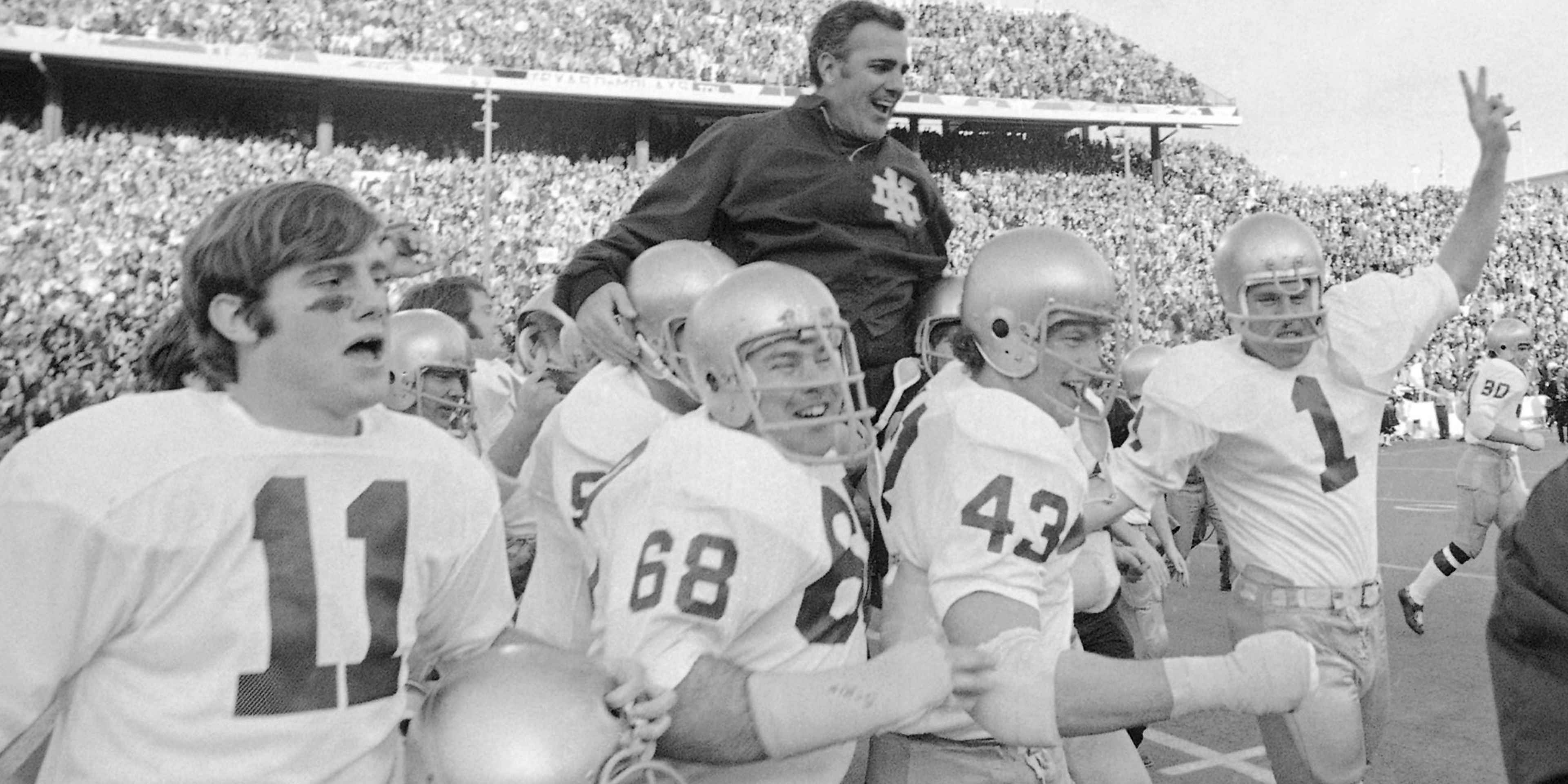 FILE - In this Jan. 1, 1971, file photo, Notre Dame coach Ara Parseghian is carried off the field by his victorious players after the Irish victory over Texas 24-11 in the Cotton Bowl NCAA college football game in Dallas. The Associated Press has been ranking the best teams in college football for the last 80 seasons. (AP Photo/File)