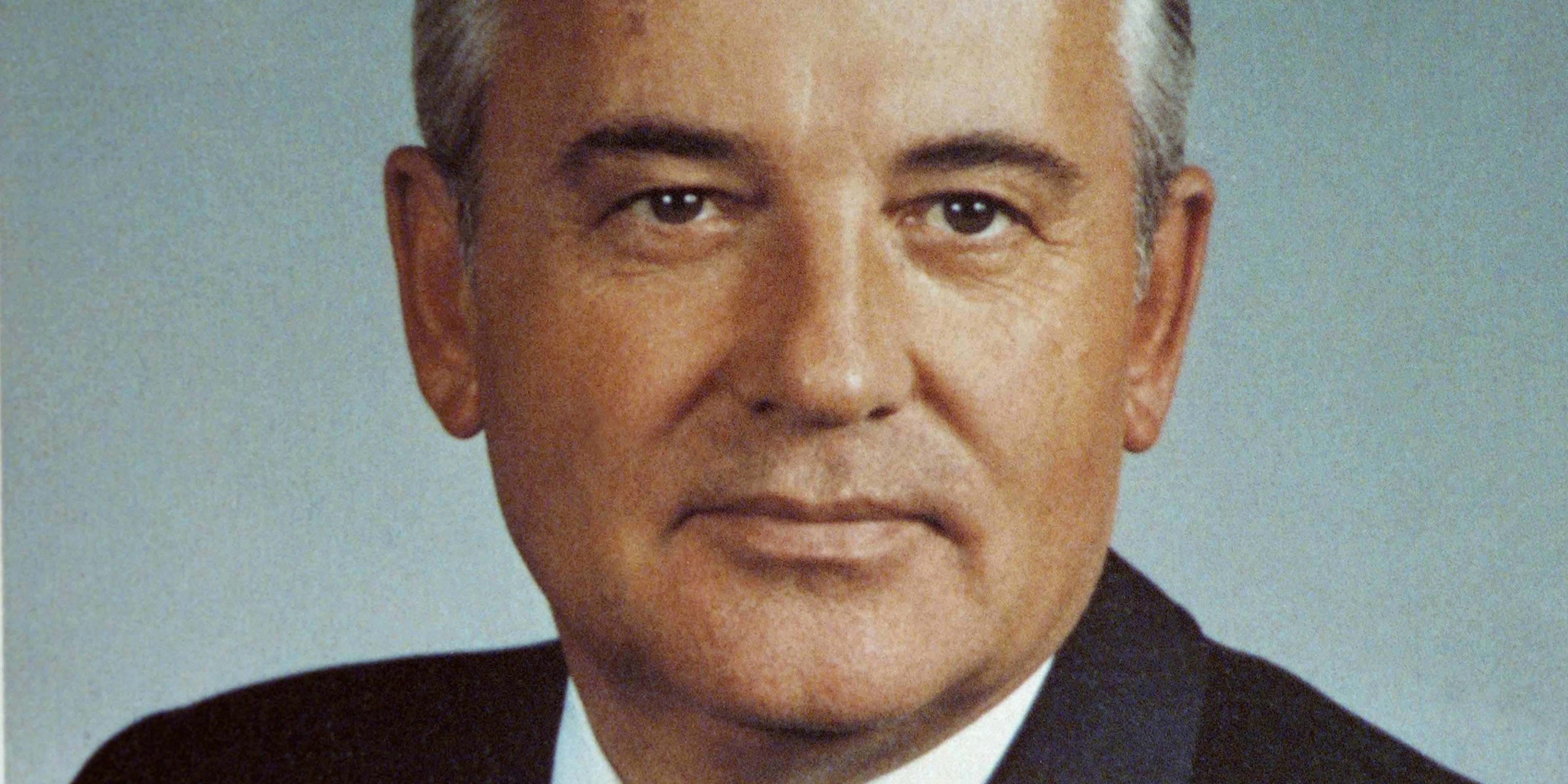 A portrait of Mikhail Gorbachev featured on his book cover, 'Perestroika.'