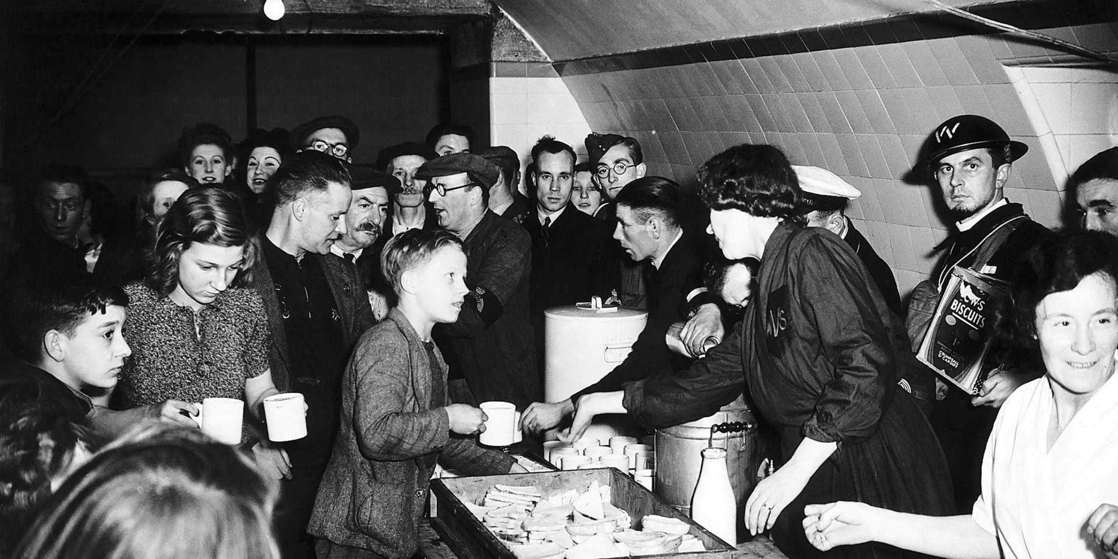 The Women’s Voluntary Services provide tea and sandwiches at the Liverpool Street station in October 1940.