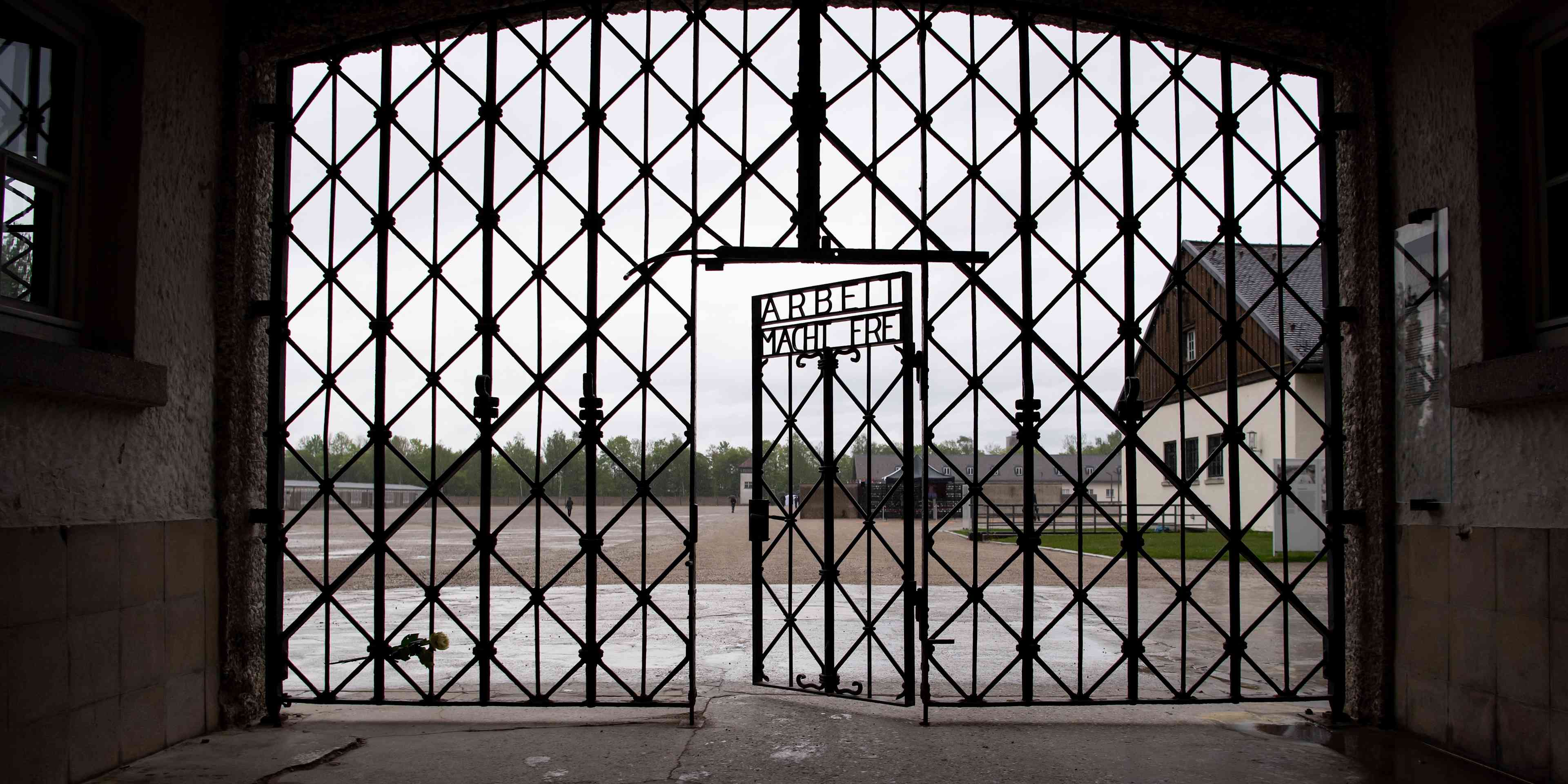 The entrance gate with the inscription "Arbeit macht frei" can be seen at the Dachau concentration camp memorial site. US soldiers liberated more than 30,000 people imprisoned in the camp on April 29, 1945.