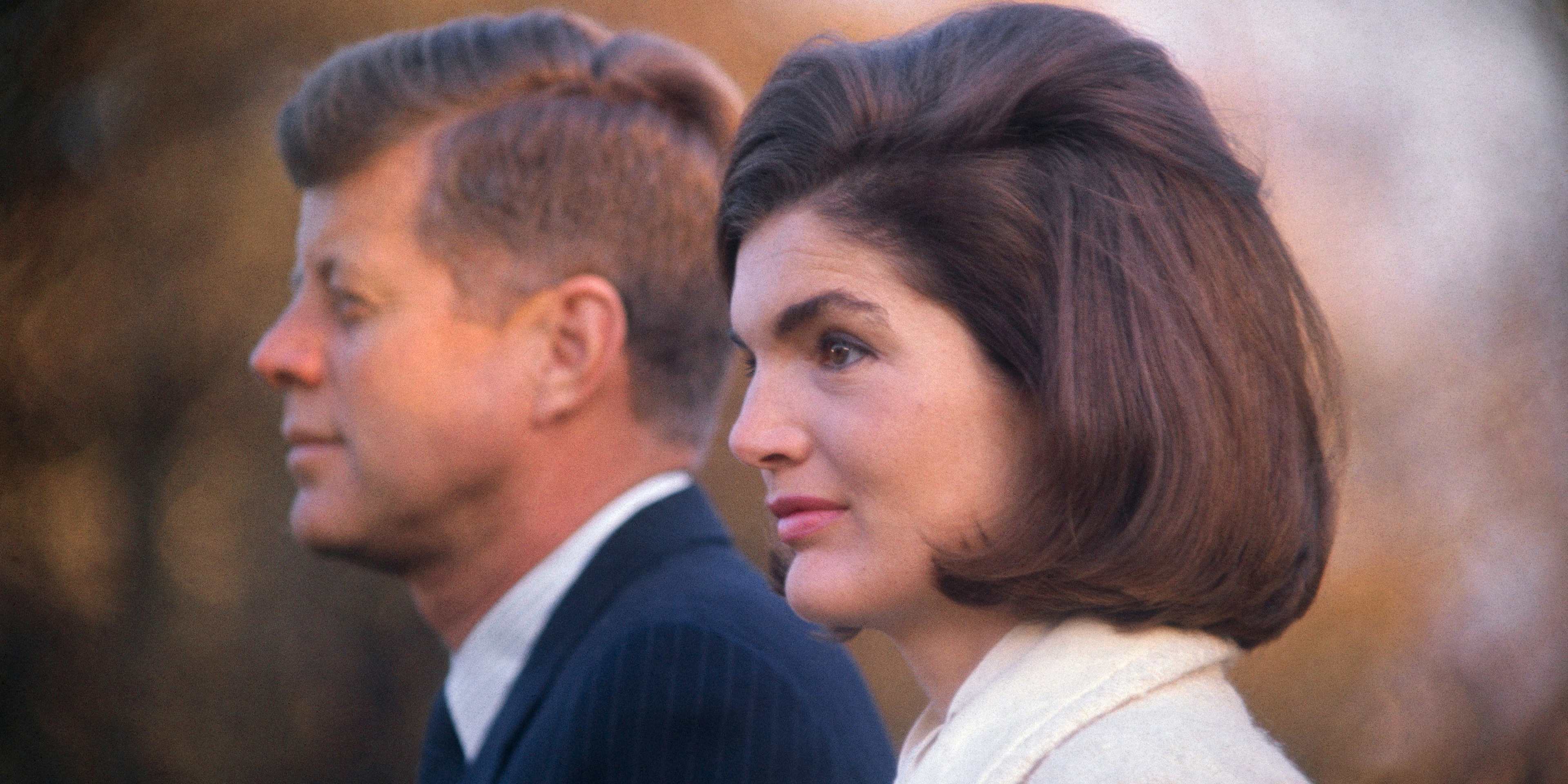 John F. Kennedy and Jackie Kennedy are shown on the White House lawn.
