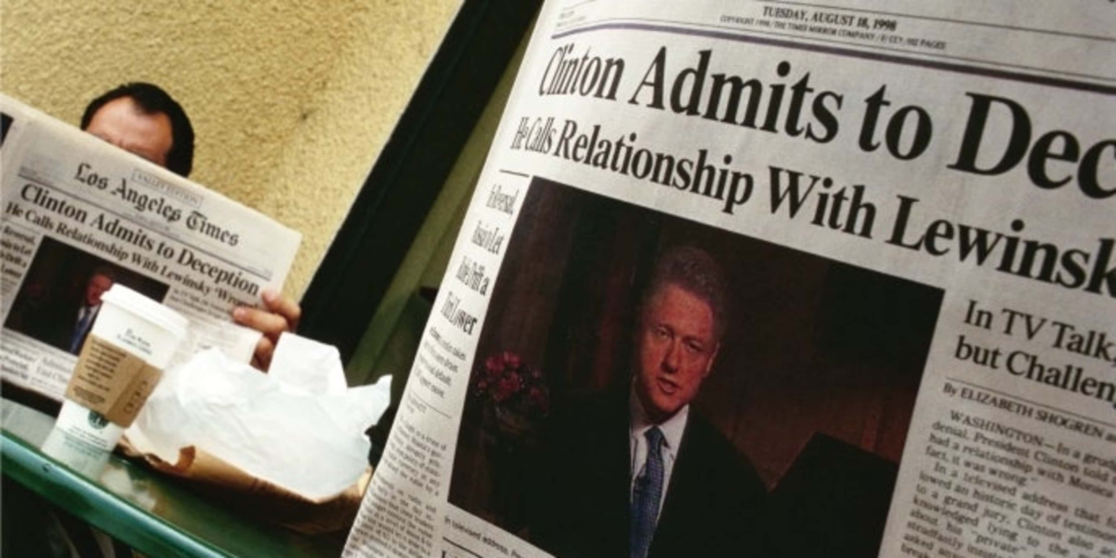 People in a California coffee shop read the Los Angeles Times the day after President Bill Clinton admitted to having a relationship with Monica Lewinsky.