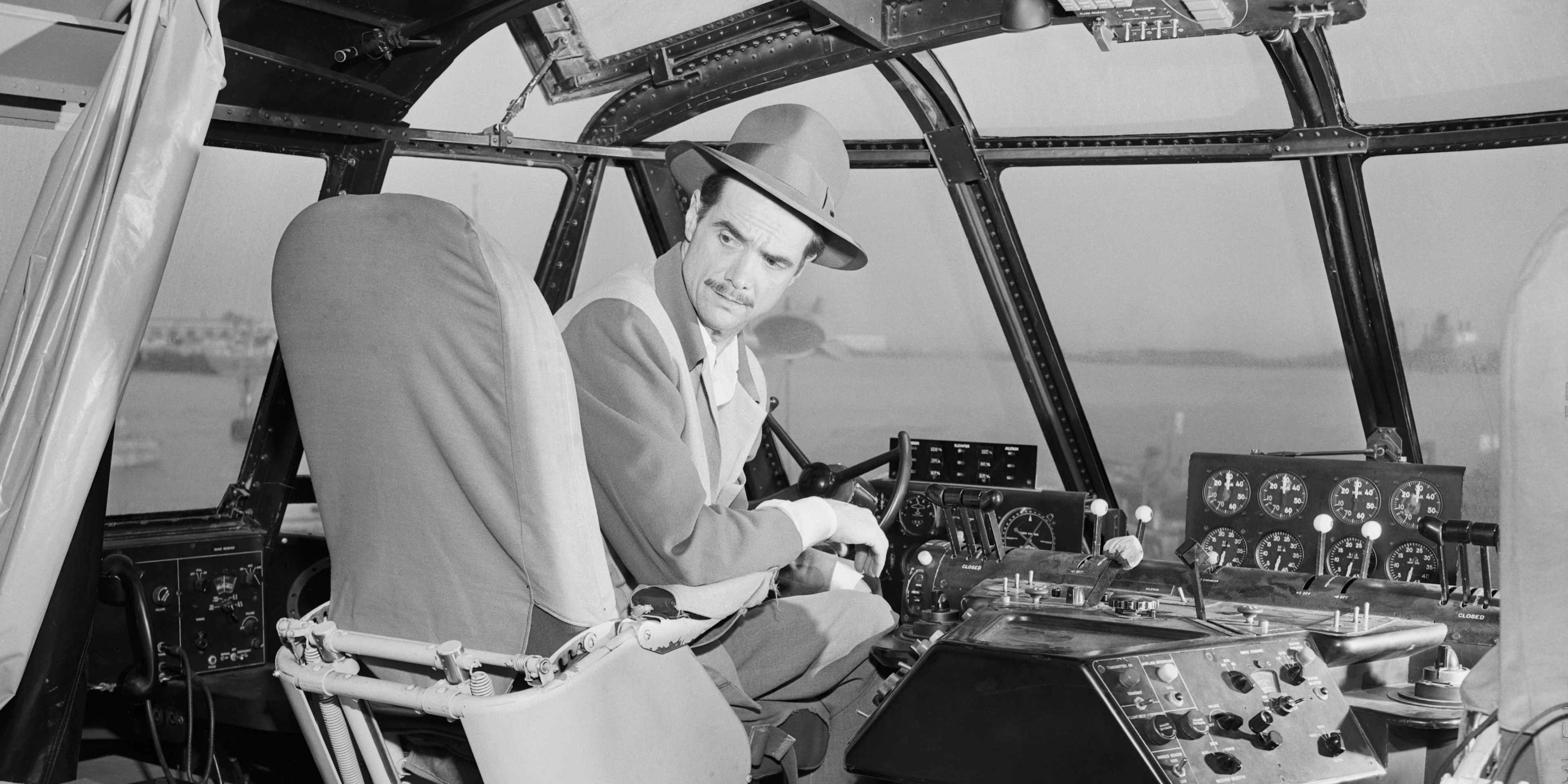 American aircraft designer Howard Hughes prepares for the trial run of his strategic airlift flying boat, the Hughes H-4 Hercules (aka the 'Spruce Goose'), Los Angeles harbor, 2nd November 1947. The brief flight was the aircraft's first and only time airborne.