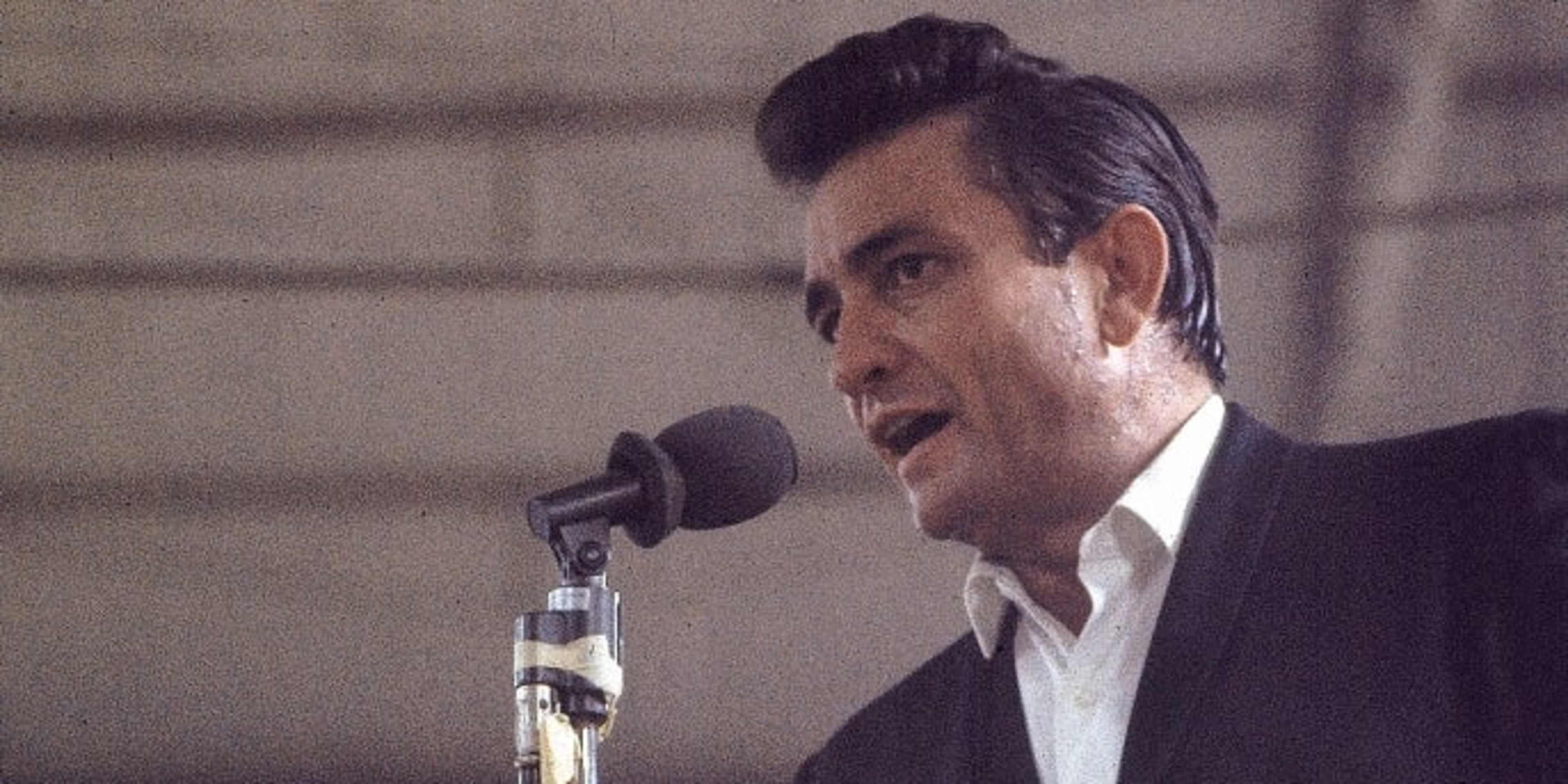 Country singer Johnny Cash performing for prisoners at the Folsom Prison in California on January 13, 1968. The performance was recorded for his live album "Johnny Cash at Folsom Prison."  (Credit: Dan Poush/AP Photo)