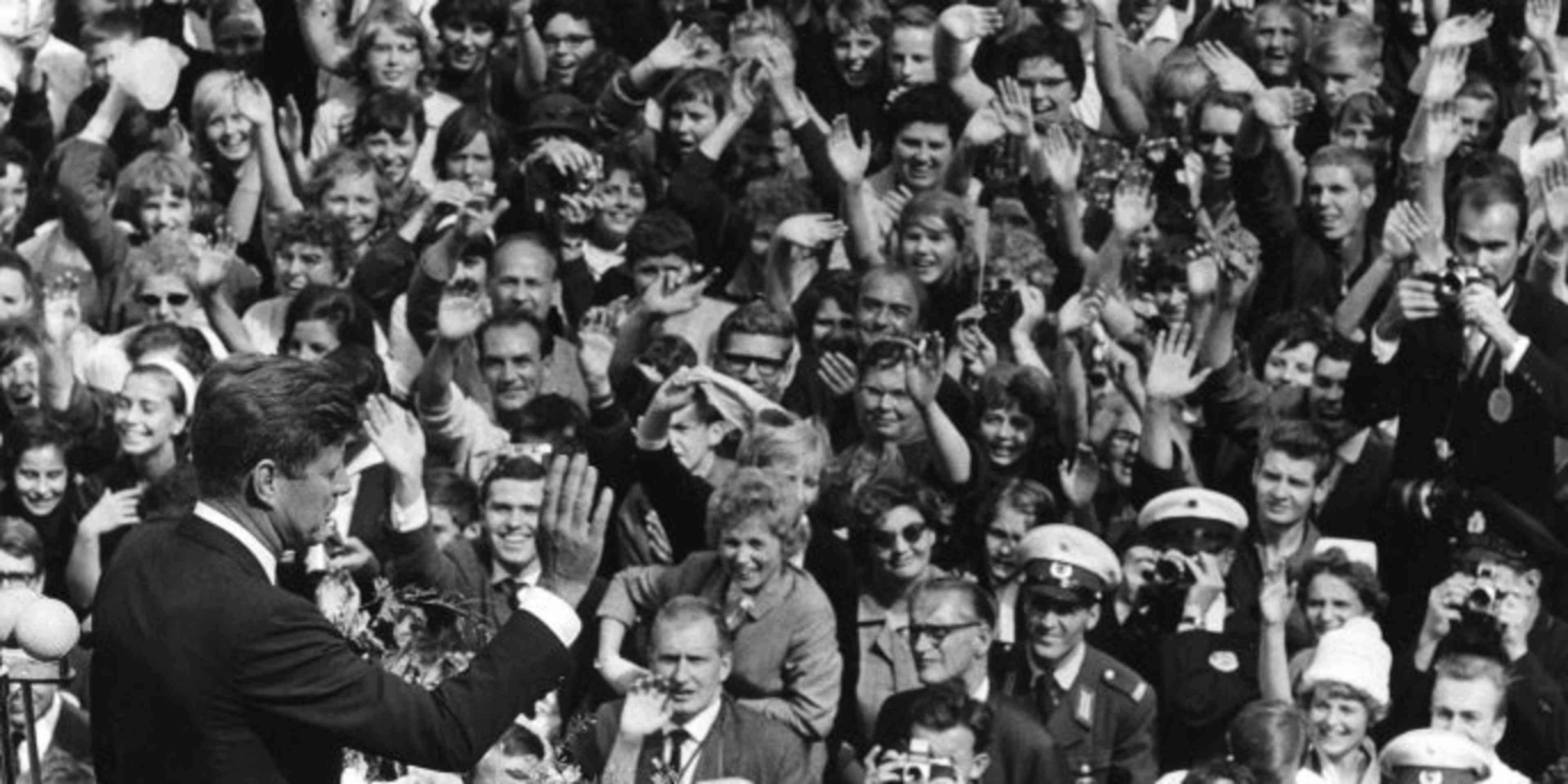 John F. Kennedy delivers a speech to a massive crowd in Berlin, Germany, June 26, 1963. (Credit: PhotoQuest/Getty Images)