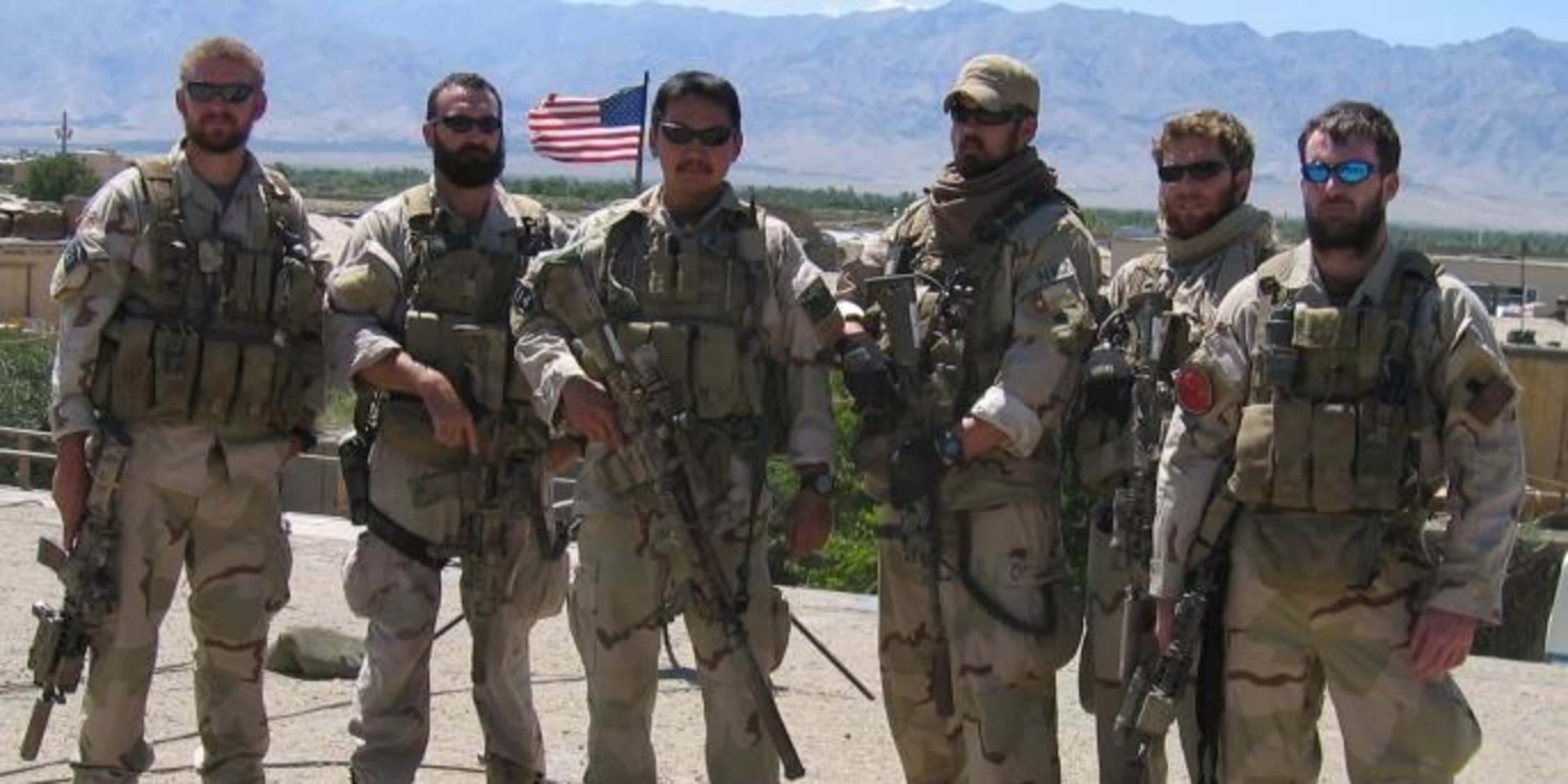 Matthew G. Axelson, Daniel R. Healy, James Suh, Marcus Luttrell, Eric S. Patton and Michael P. Murphy pose in Afghanistan on June 18, 2005. Ten days later, all but Luttrell would be killed by enemy forces while supporting Operating Red Wings, which also claimed the lives of Danny Dietz and 13 other Navy Seals.