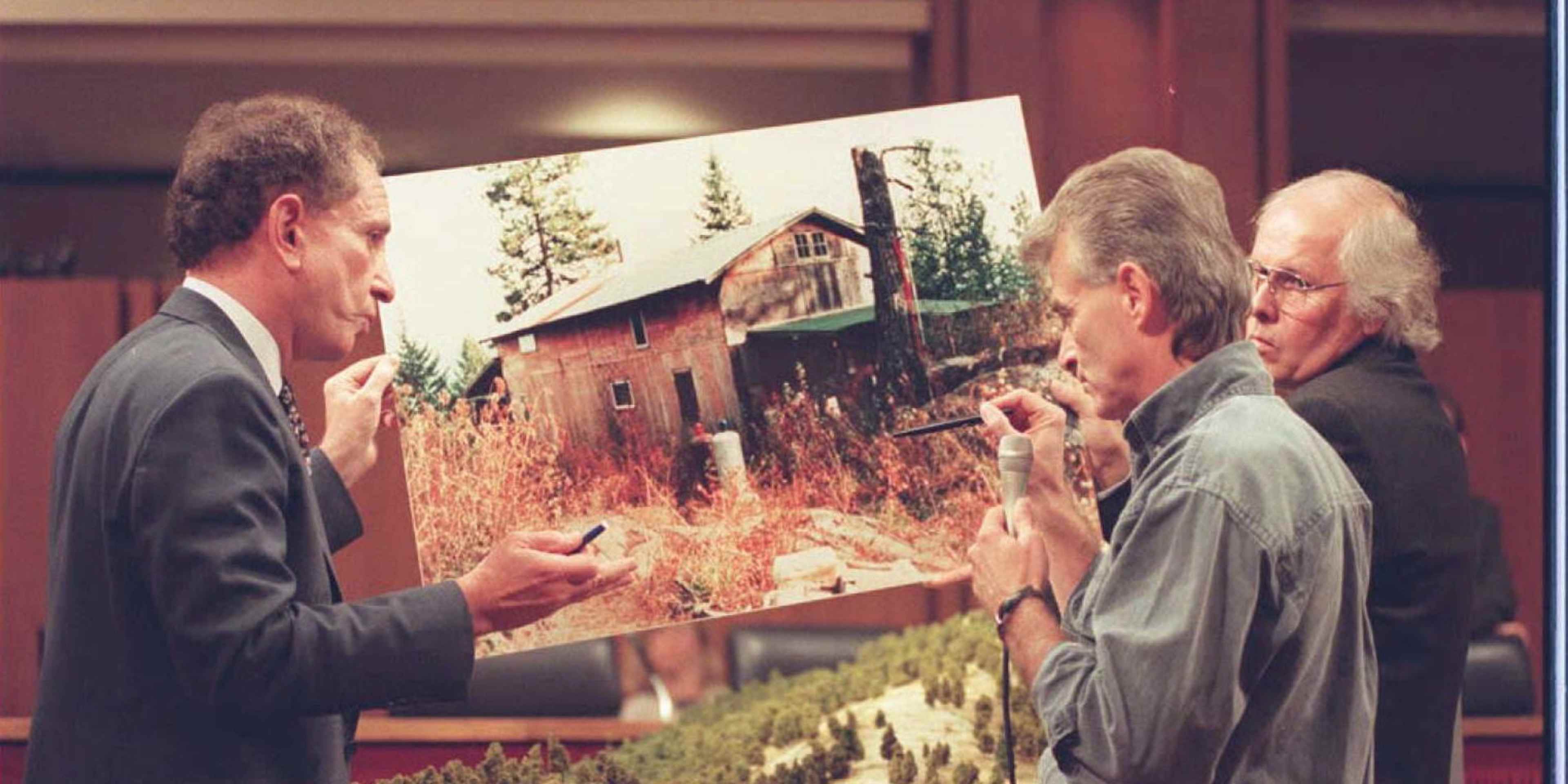 WASHINGTON, DC - SEPTEMBER 6: Randy Weaver (C) shows a model of his Ruby Ridge, Idaho cabin to US Senator Arlen Specter, R-PA ,(L), 06 September on Capitol Hill during Senate hearings investigating the events surrounding the 1992 standoff with federal agents. Weavers' wife and son were killed by FBI agents during the seige. AFP PHOTO (Photo credit should read PAMELA PRICE/AFP via Getty Images)