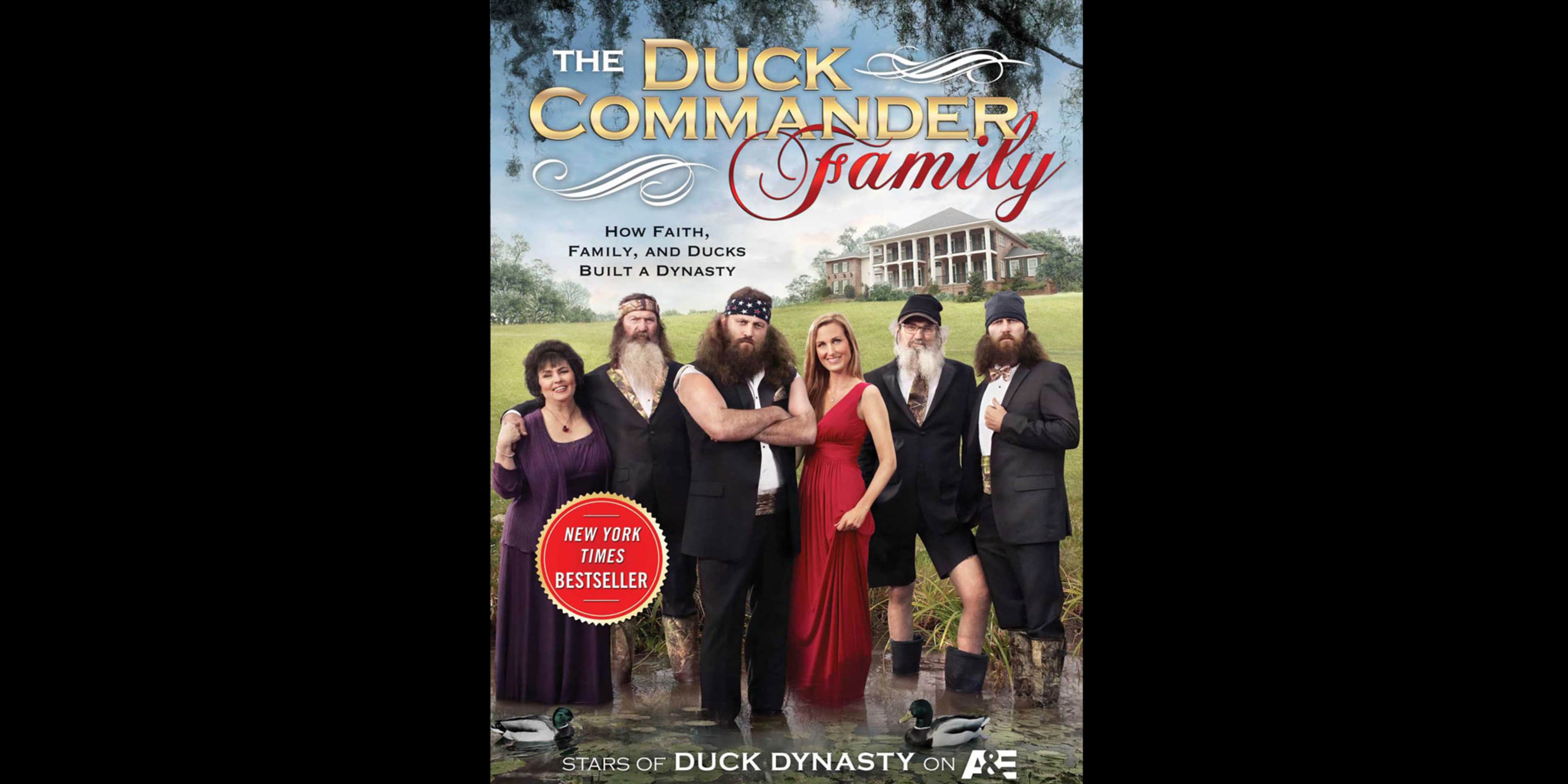 The image features the cast of the reality TV show "Duck Dynasty" posing together in formal attire, with a rural, wooded background.