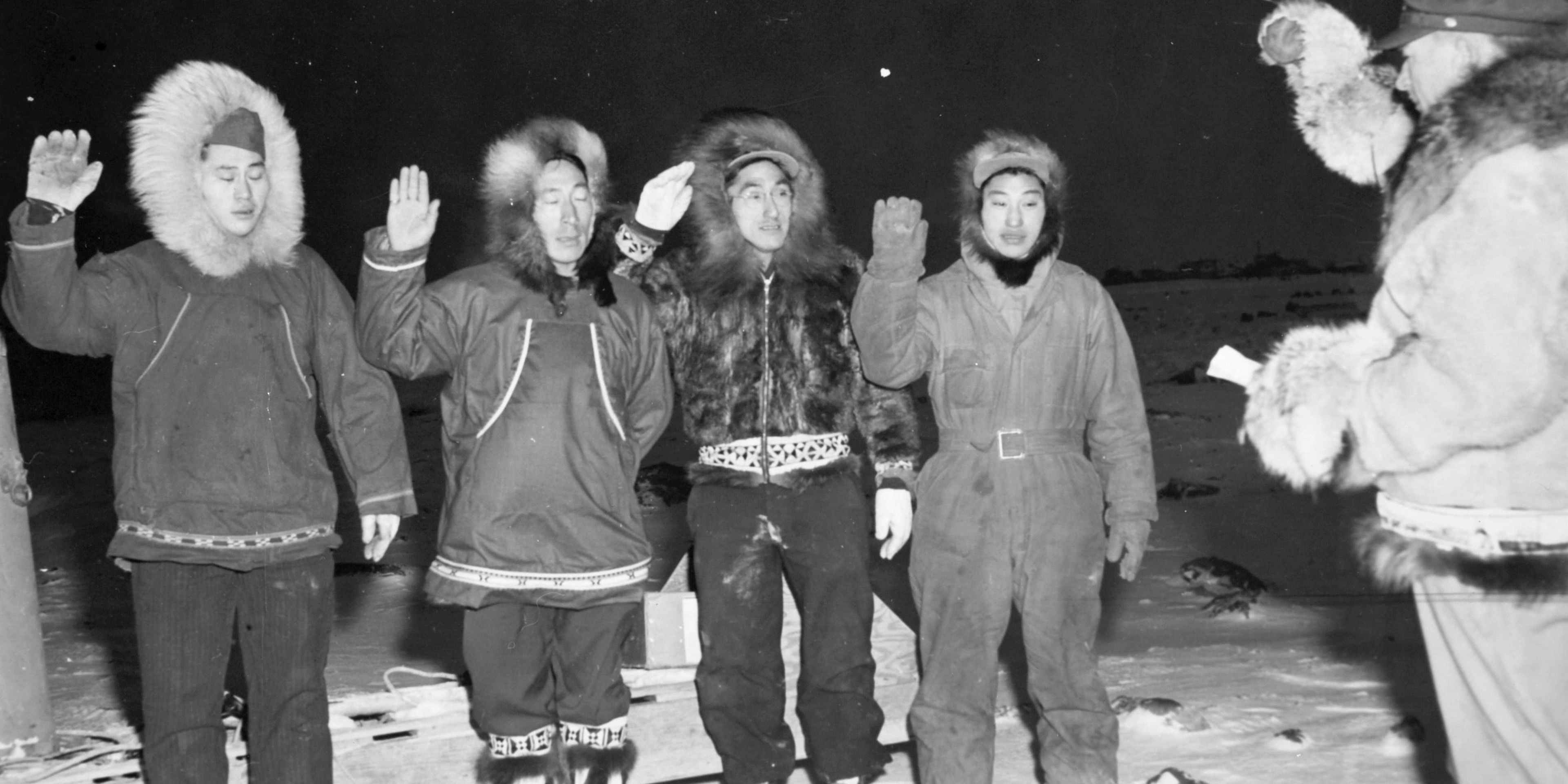 Four Alaska Territorial Guardsmen being sworn in for an assignment in Barrow, Alaska.