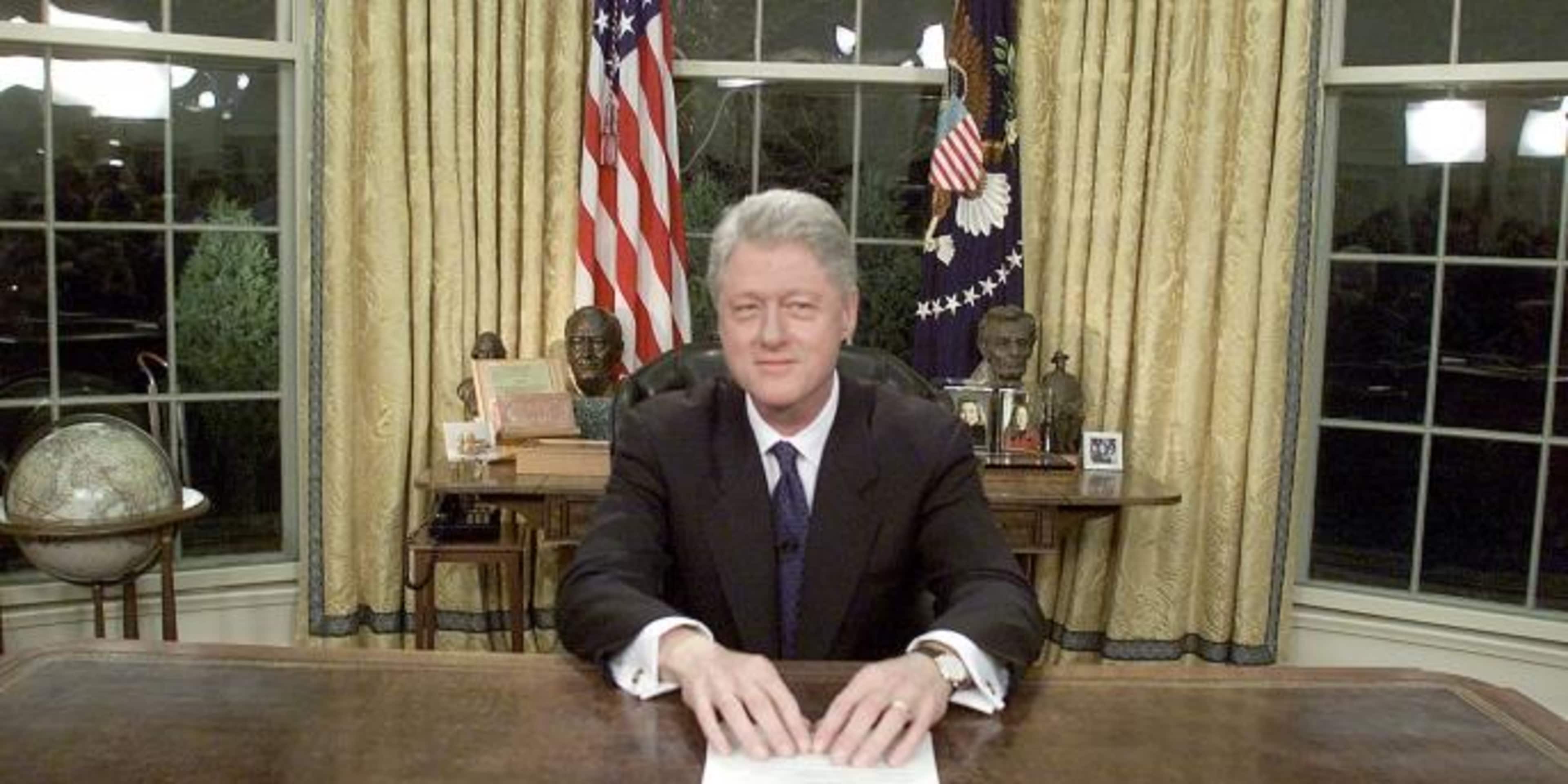 US President Bill Clinton poses for photographers January 18, 2001 after delivering his farewell address to the nation. (Credit: Mark Wilson/Newsmakers)