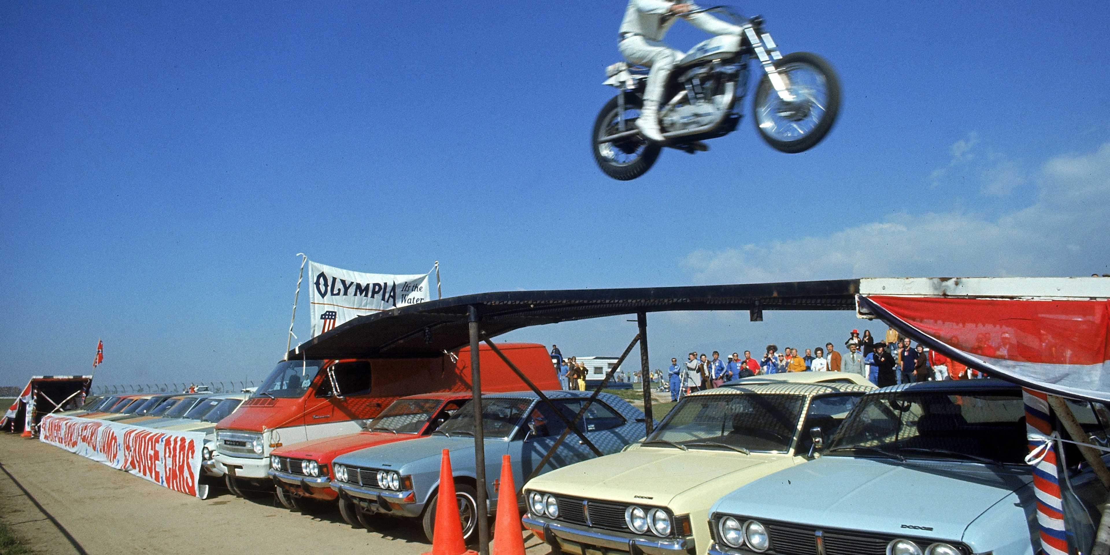 Evel Knievel mid-jump during a successful attempt to jump over a row of 19 cars, a record at the time, on February 28, 1971.