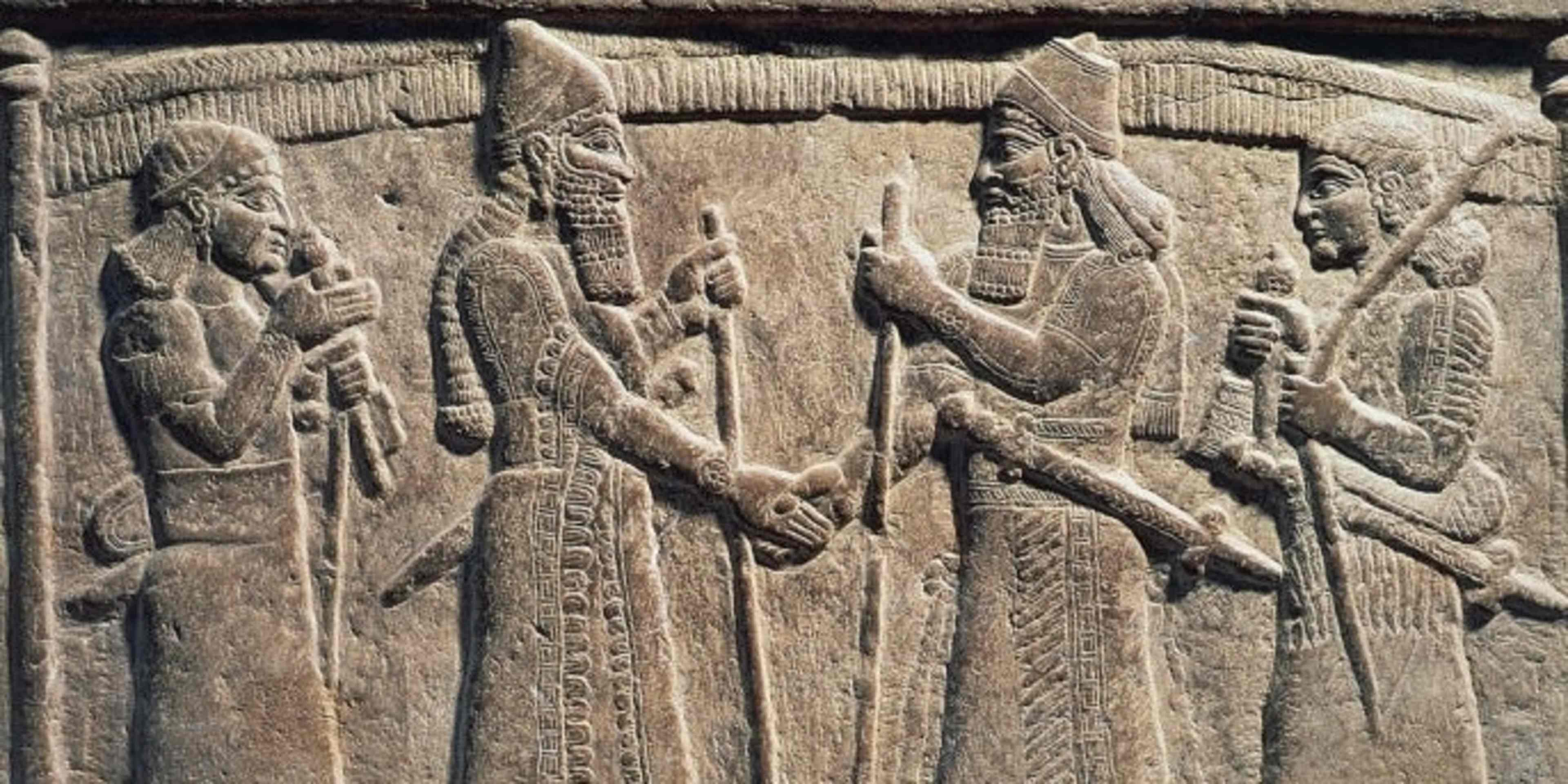 King Shalmaneser III of Assyria meeting a Babylonian, detail from Shalmaneser III's throne, relief on stone.