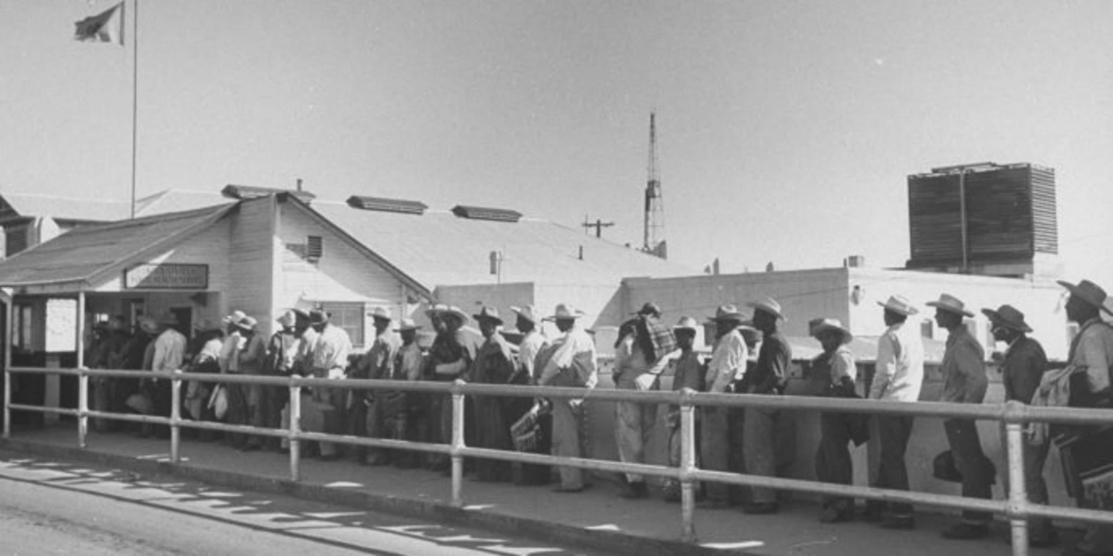 Migrant Mexican workers standing in line at the U.S. Public Health Station. The notion that Mexicans overburden the government, particularly in health, education and welfare, drove legislation to repatriate, and in some cases, sterilize immigrants.