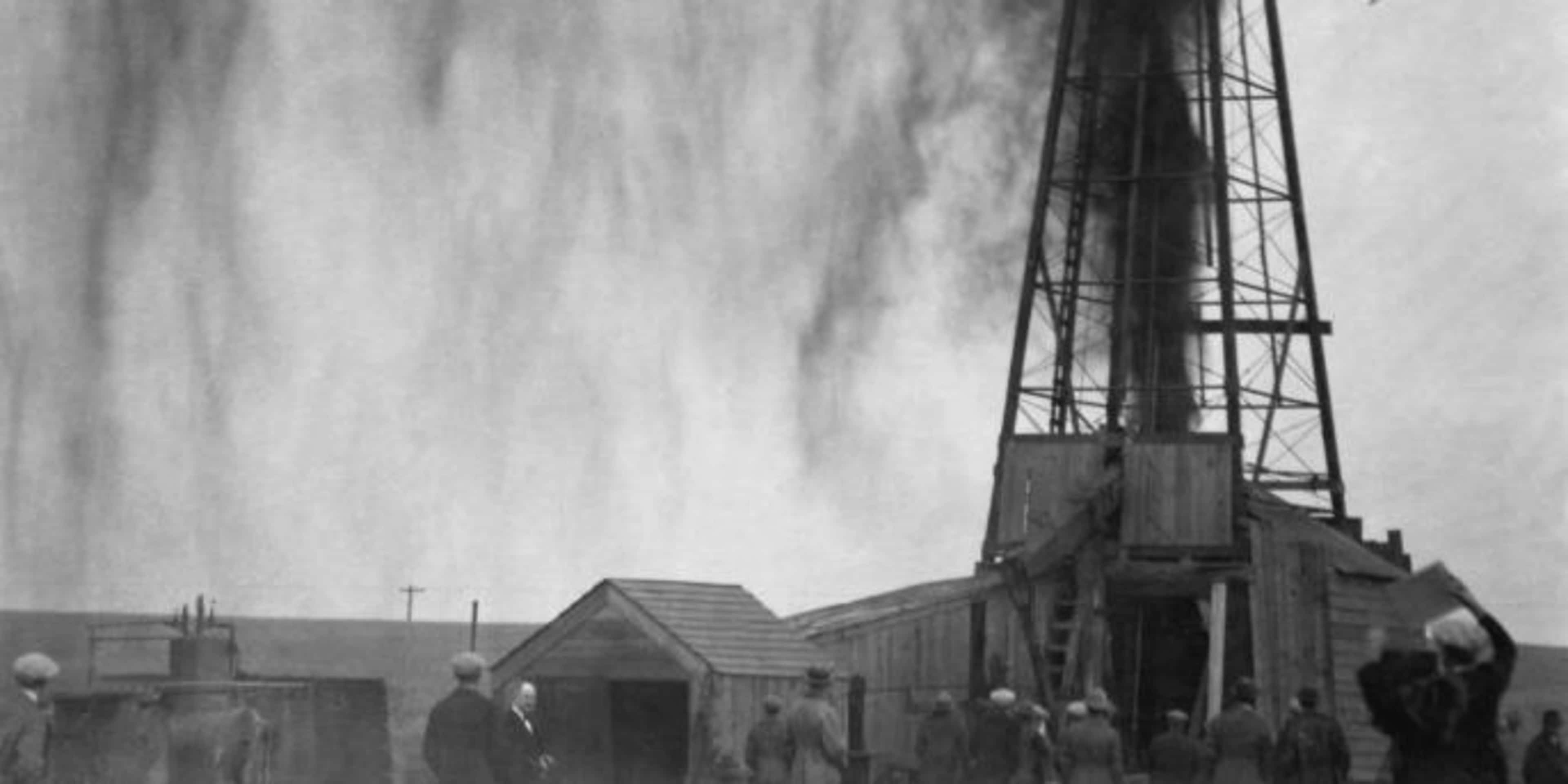 Workers strike oil in Osage territory. (Credit: David Grann)